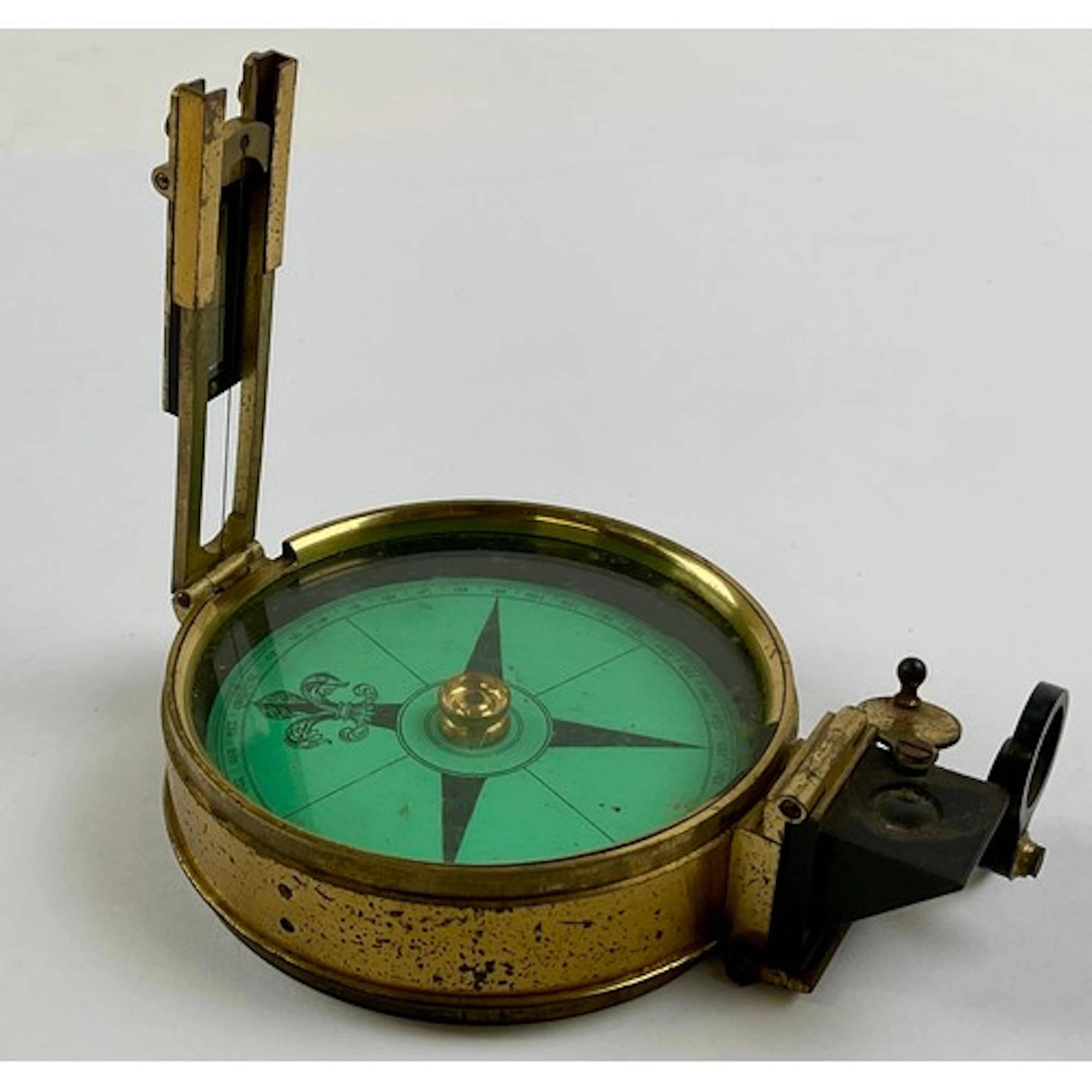 A 19th century brass prismatic compass, Elliott London, gree...