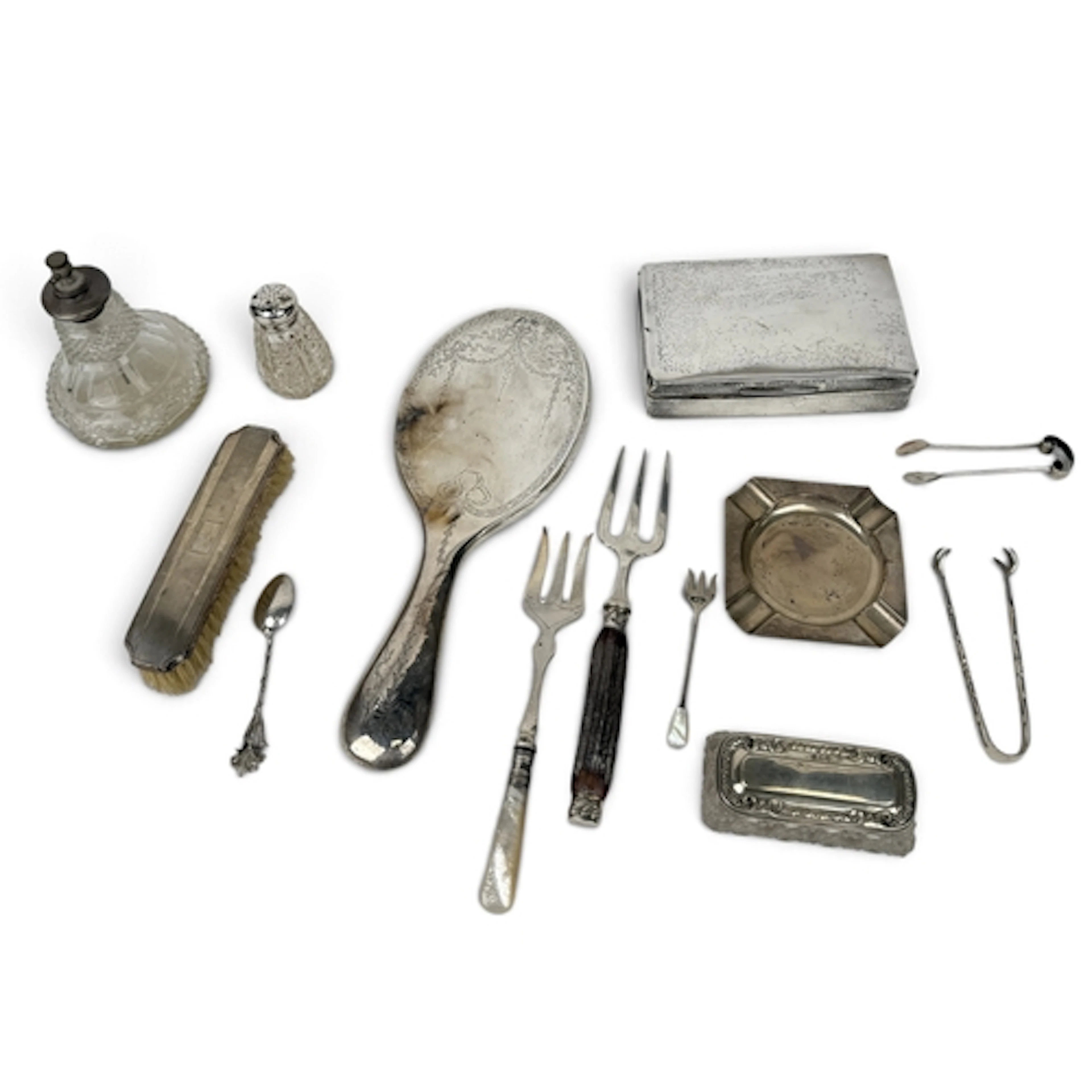 A GROUP OF SILVER TO INCLUDE THREE FORKS, TWO PAIRS OF TONGS...