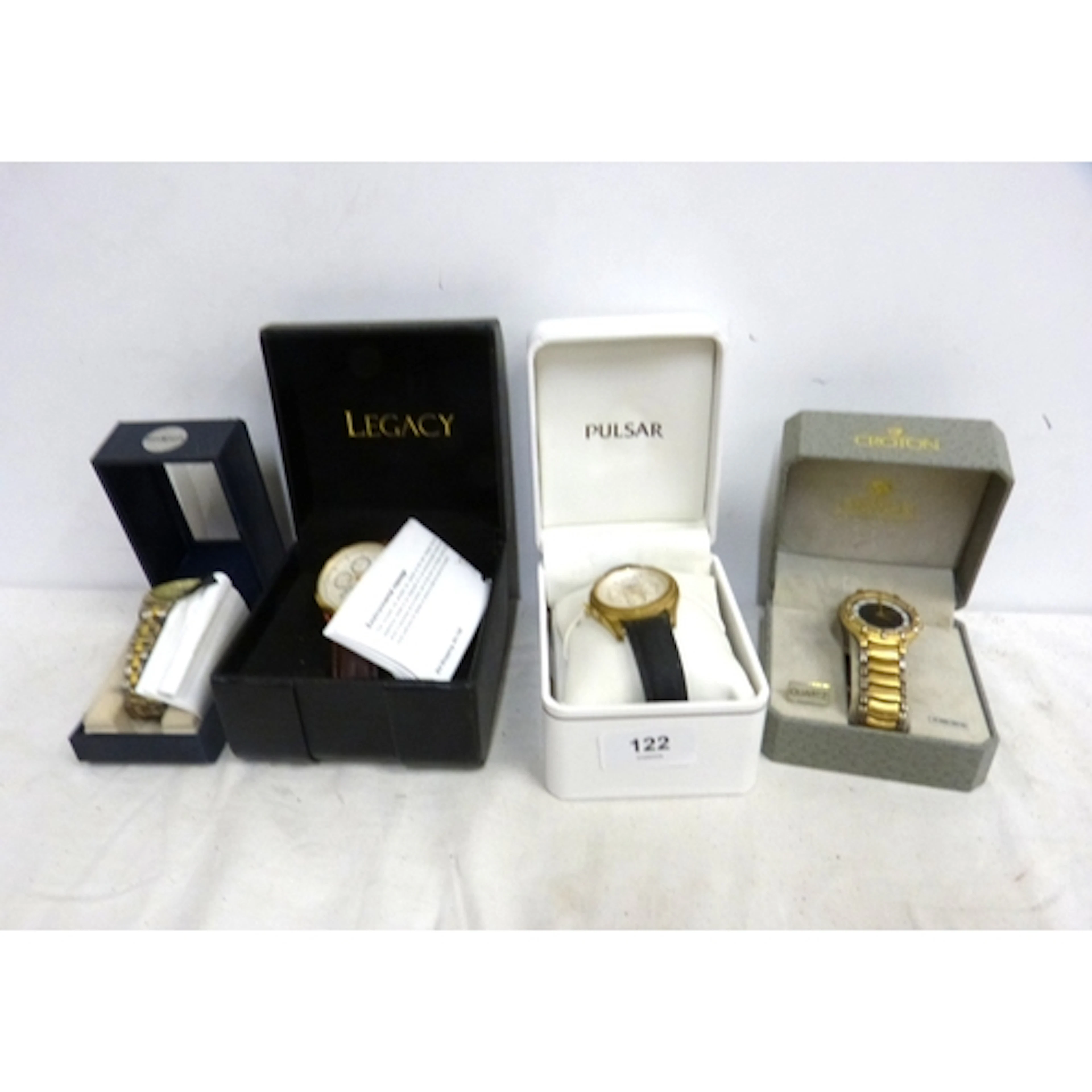 Four boxed men's watches including Sekonda, Croton, Pulsar a...