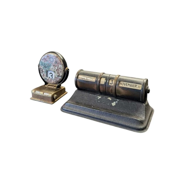 Two early 20th century perpetual desk top calendars. The lar...