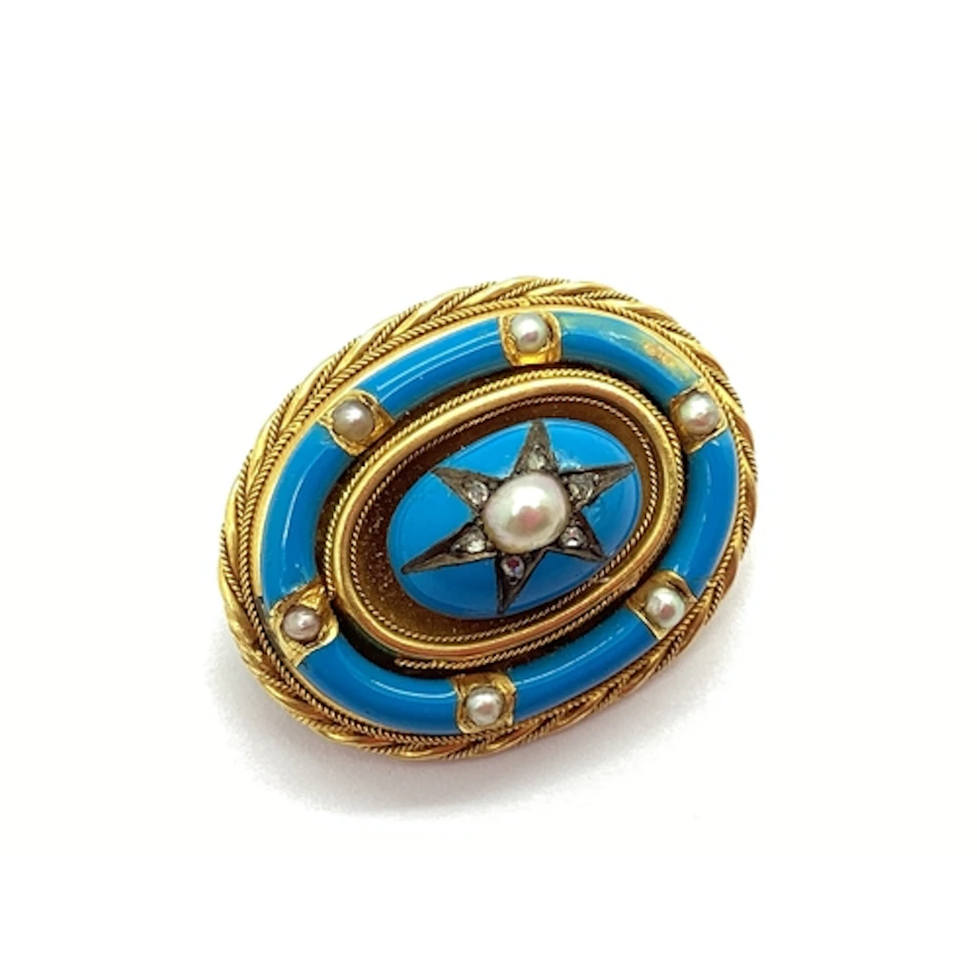 A Victorian Pearl and Diamond Set Oval Brooch, set with diam...