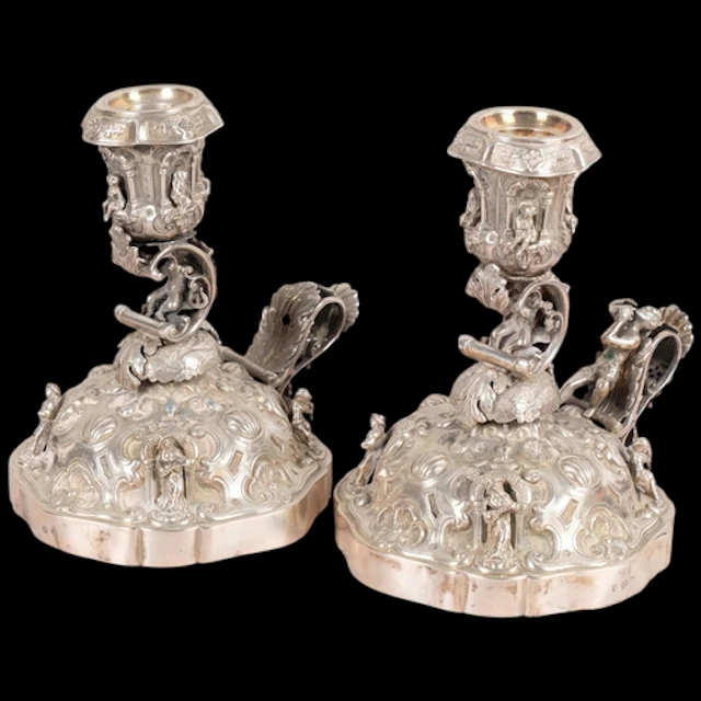 A pair of Antique German silver Rococo Revival chambersticks...