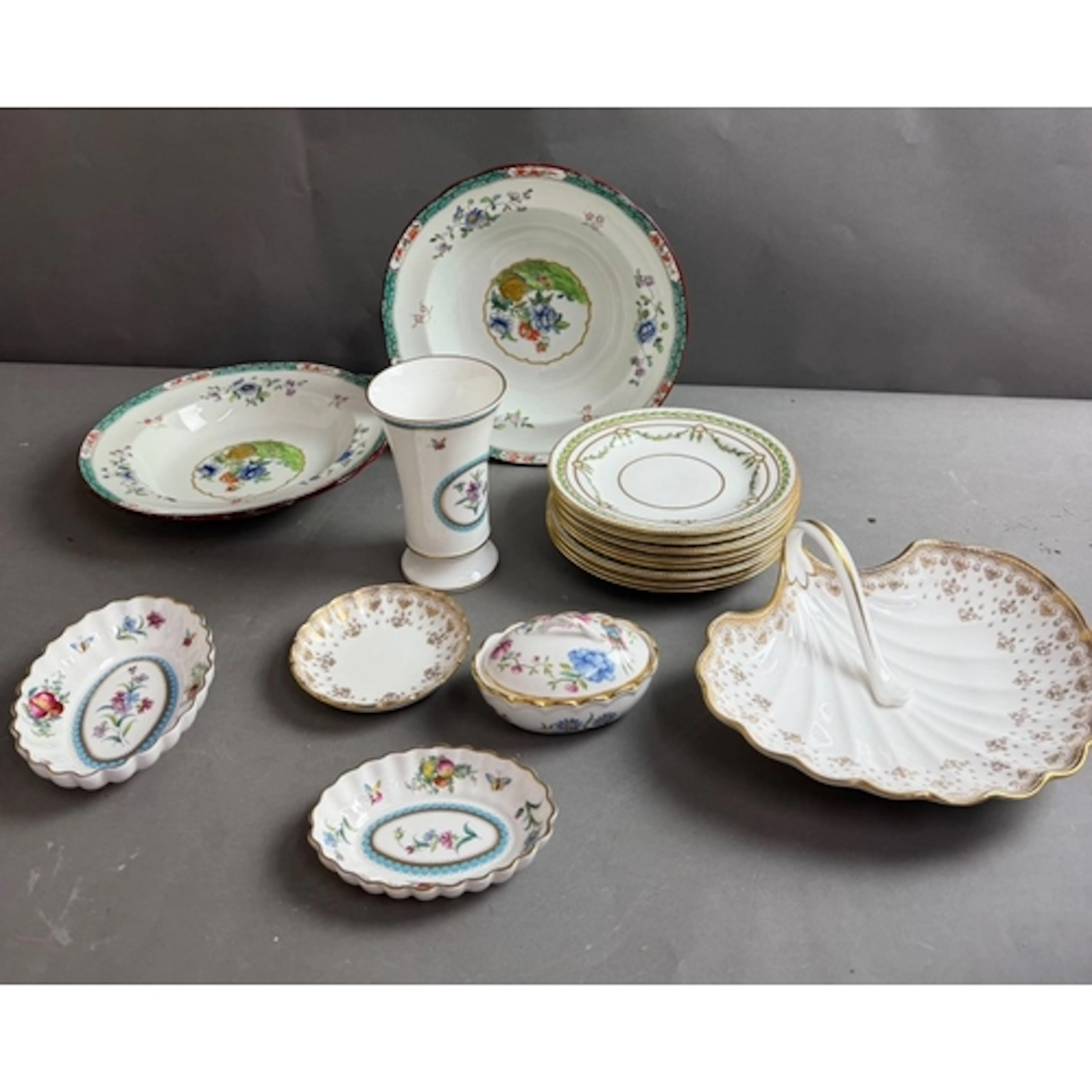 A selection of Spode china to include plates, jugs, and vase...