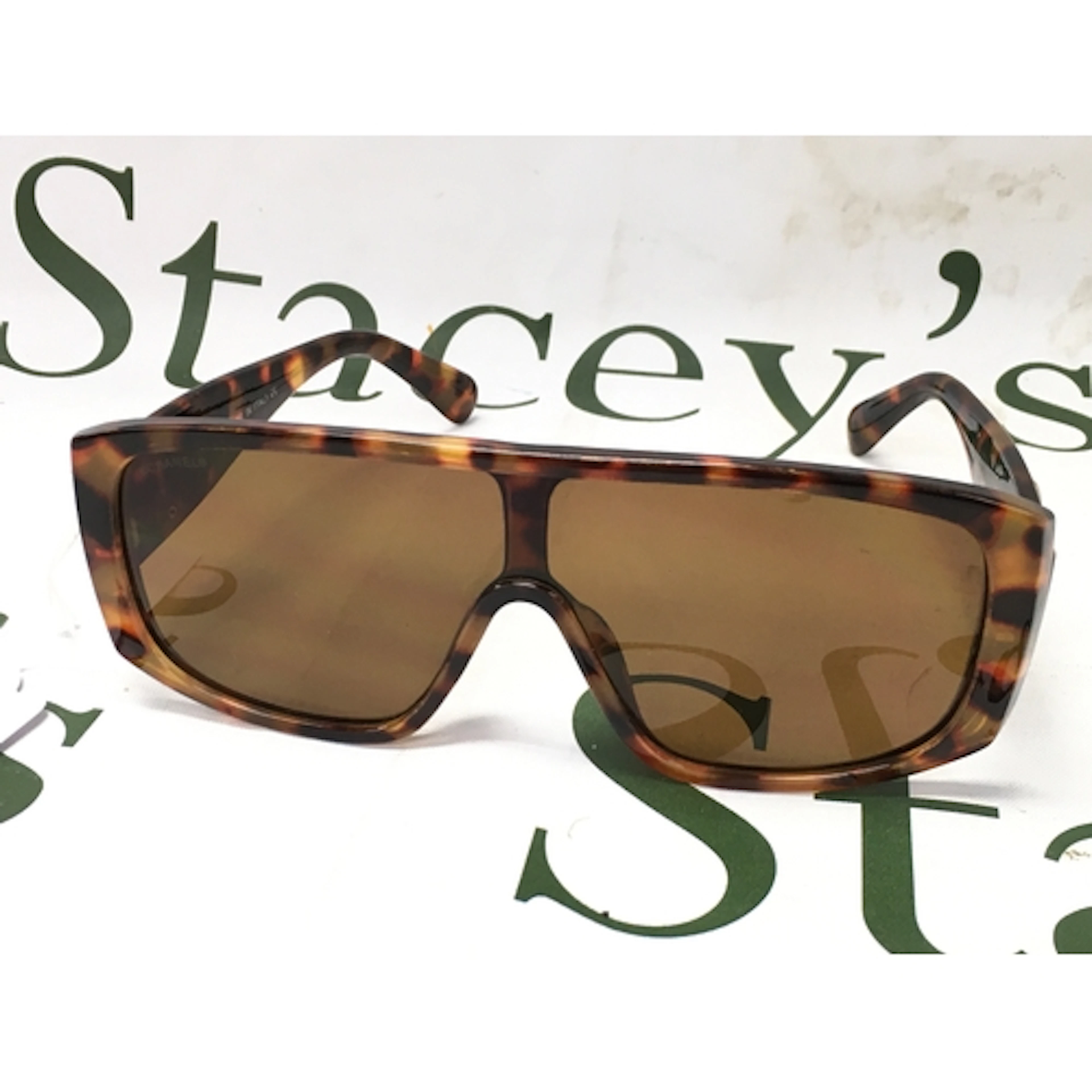 CHANEL Women's Sunglasses CH5495, featuring a bold Tortoises...