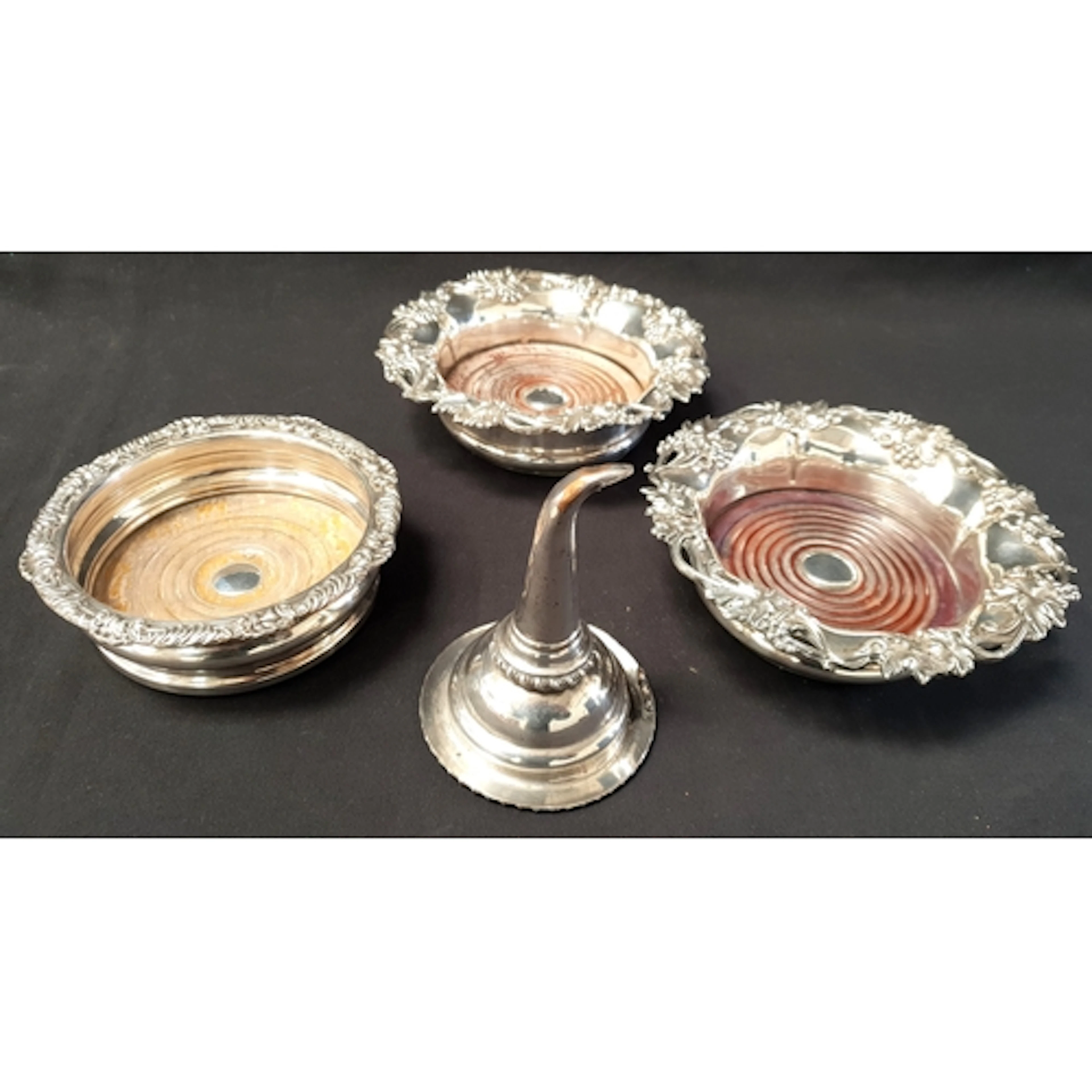 PAIR OF ORNARTE SILVER PLATED WINE SLIDES with with scroll a...
