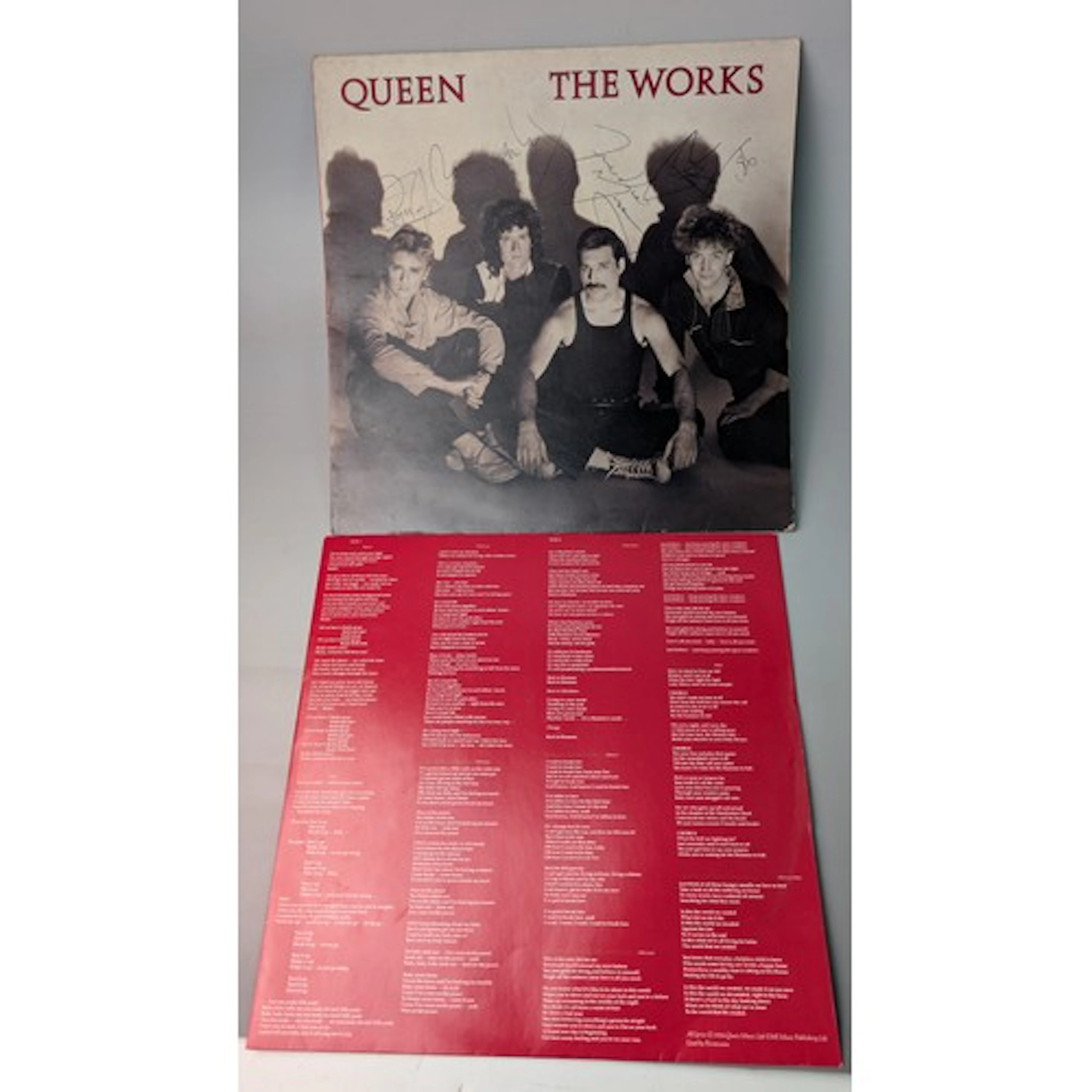 Queen The Works LP, signed to front of sleeve in biro b...