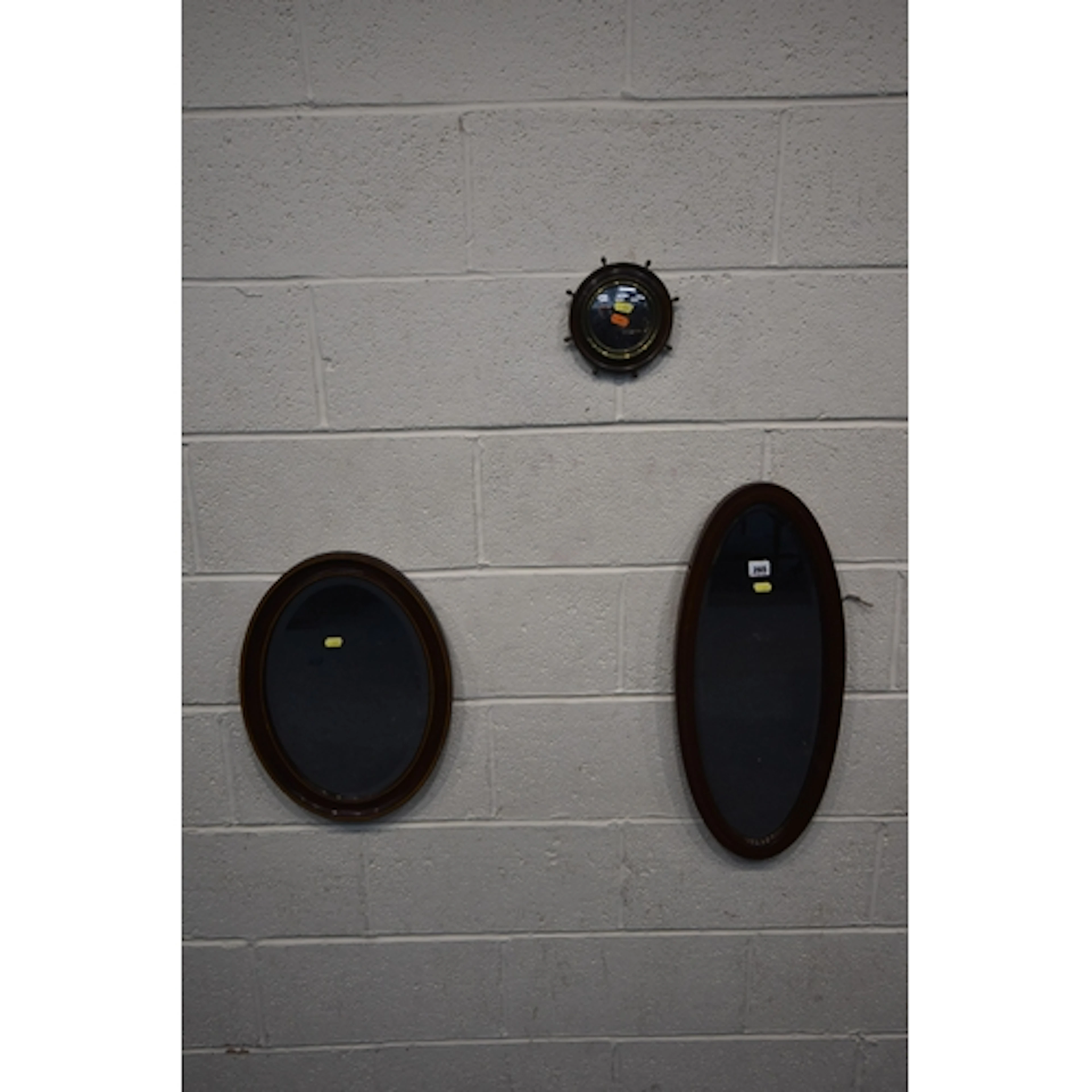 TWO OVAL MAHOGANY BEVELLED EDGE WALL MIRRORS, largest 68cm x...