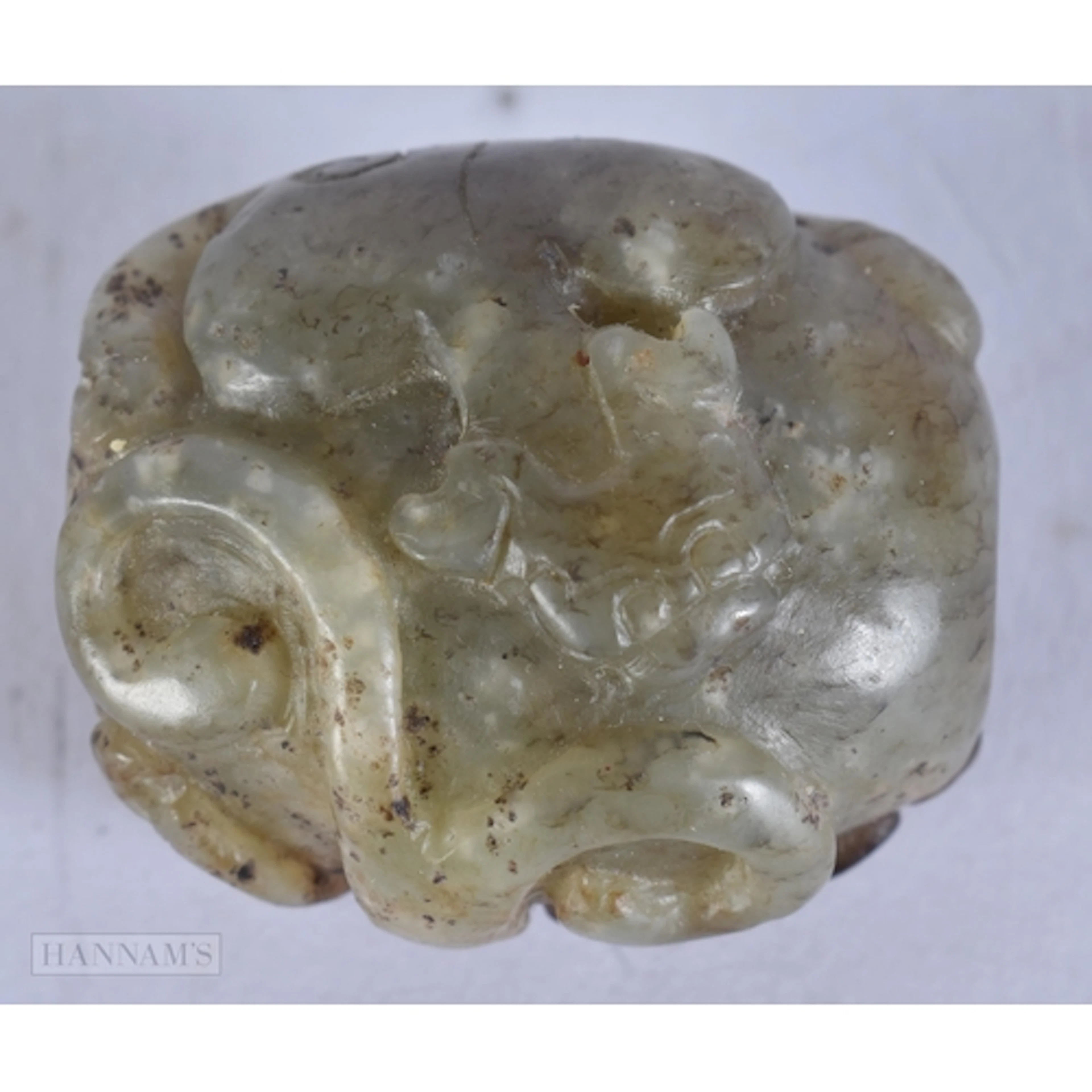 A CHINESE QING DYNASTY RUSSET JADE BEAST TOGGLE. 3.5 cm x 2....