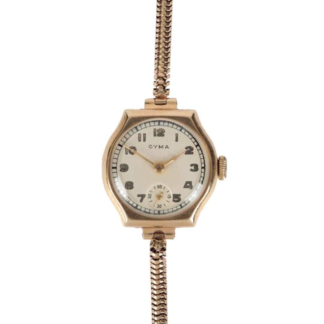 A lady's 1950's 9ct gold Cyma manual wind wrist watch, with ...