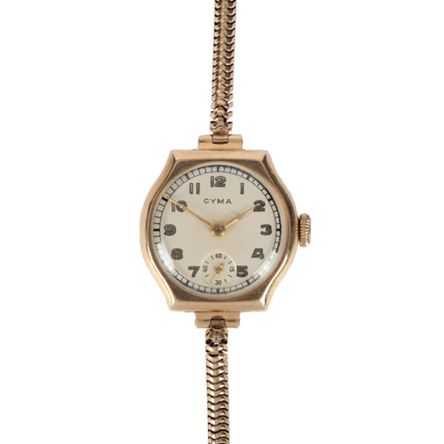 A lady's 1950's 9ct gold Cyma manual wind wrist watch, with ...