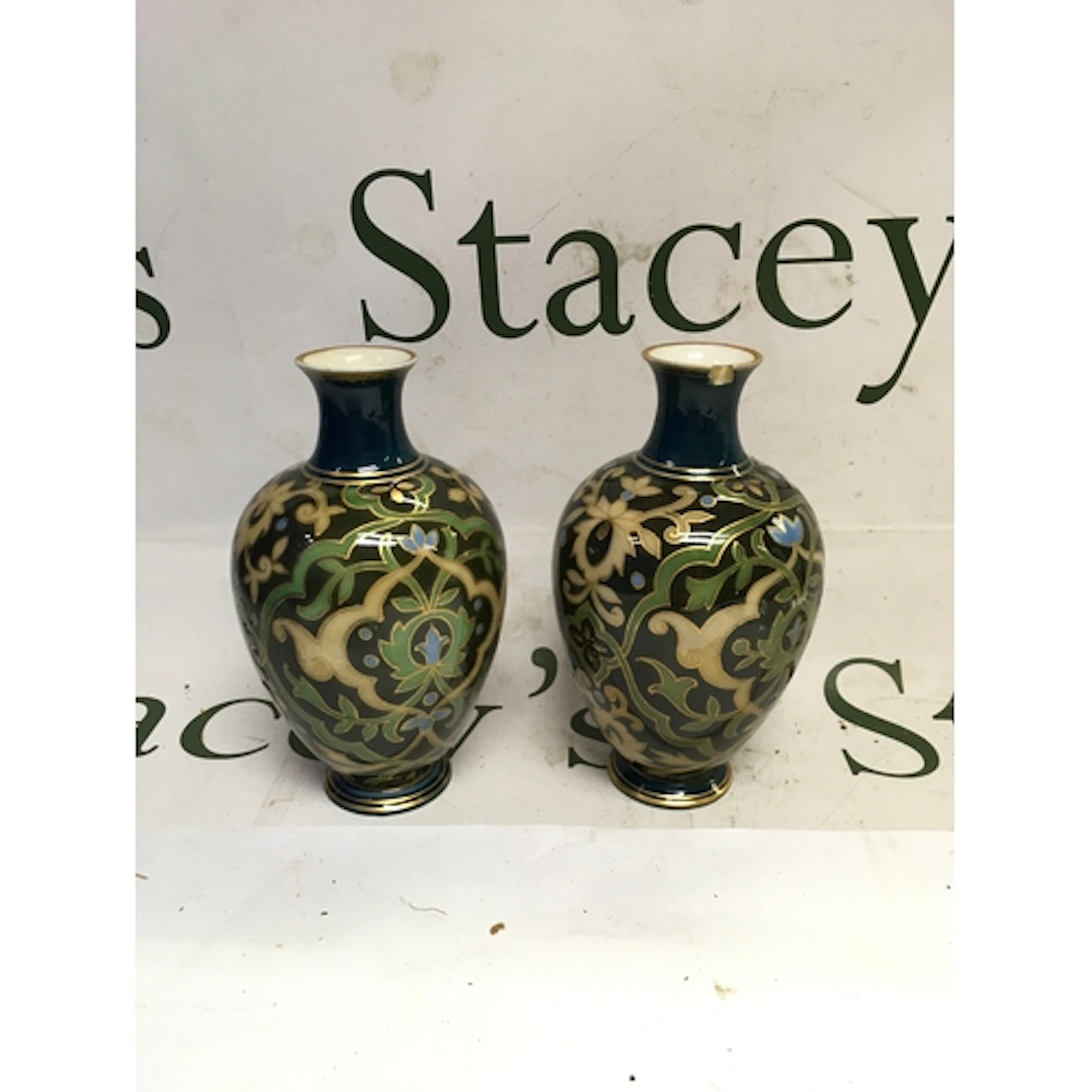 A pair of vintage porcelain bud vases