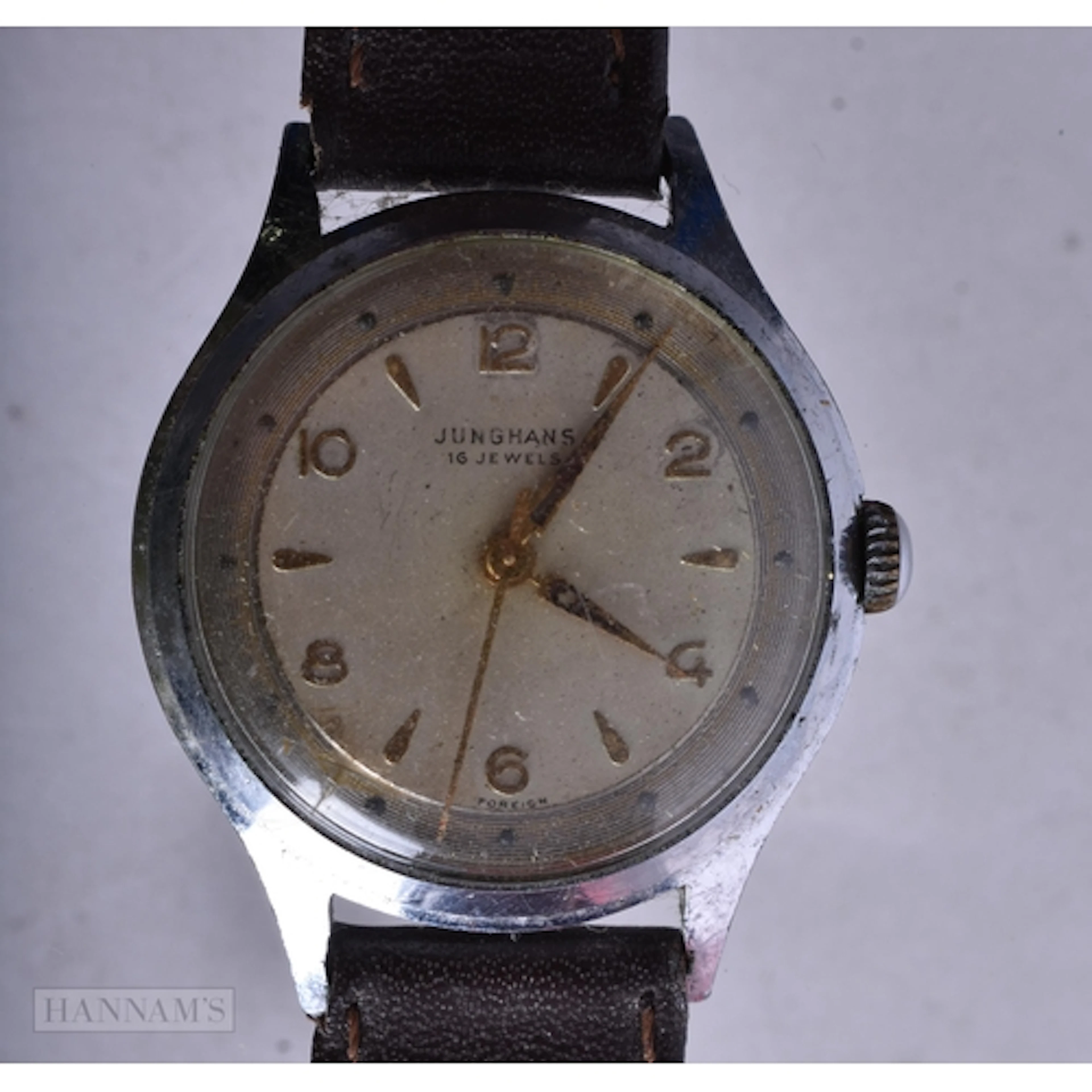 A JUNGHANS WRISTWATCH. Running. 3.25 cm wide.
