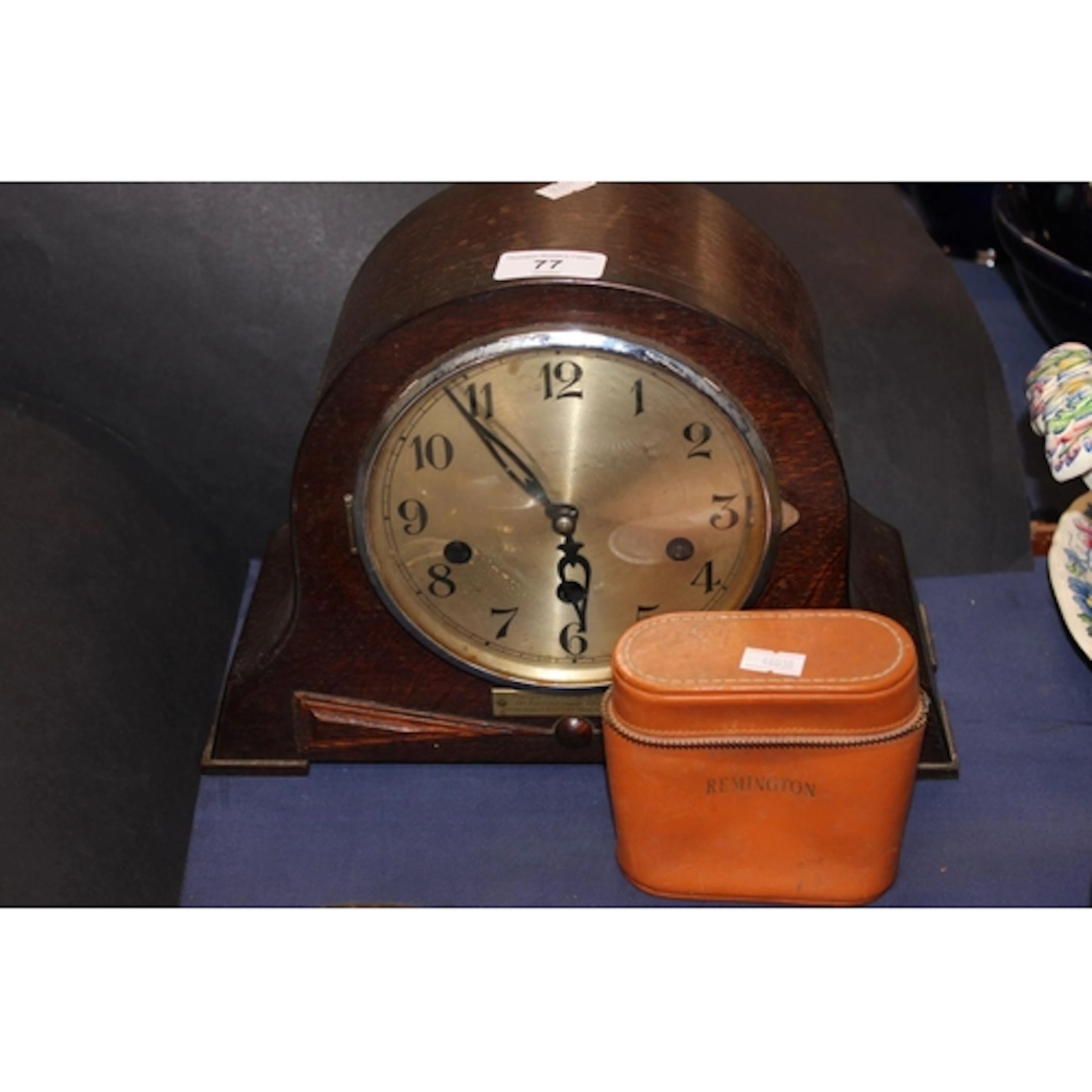 Oak mantel clock, and a pair of French opera glasses.