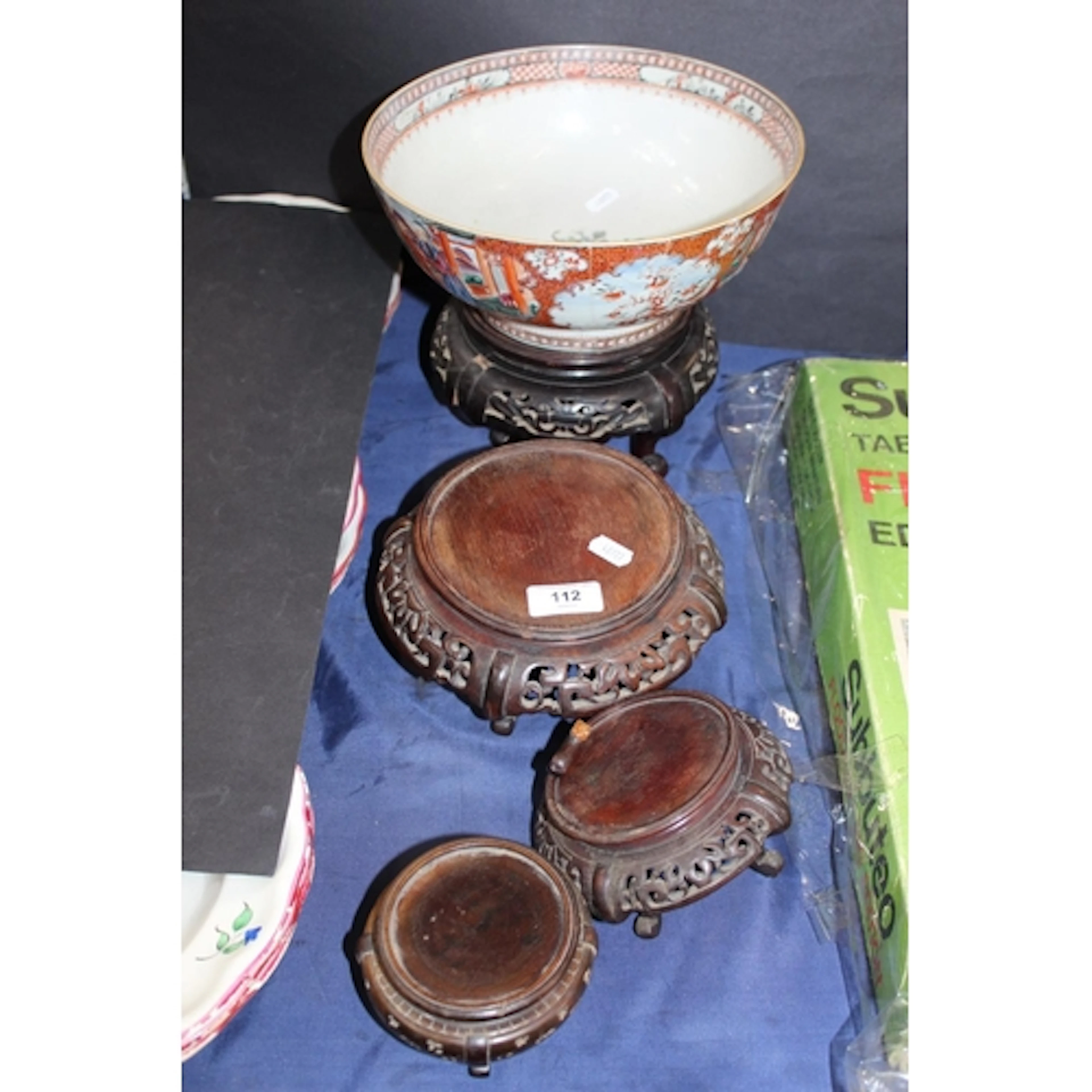 Famille rose Canton punch bowl, and four stands.