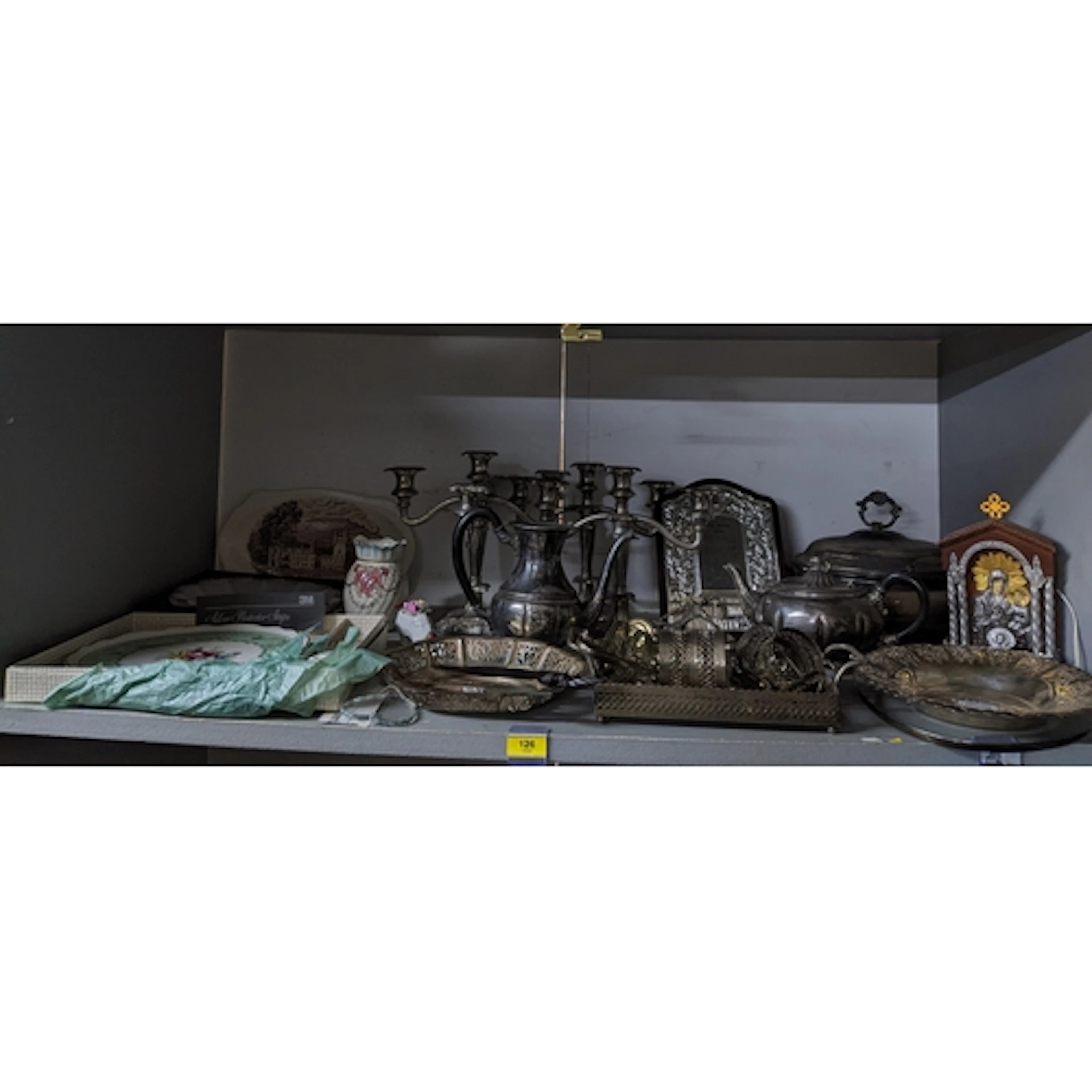 A mixed lot of mainly silver plated items to include a trio ...