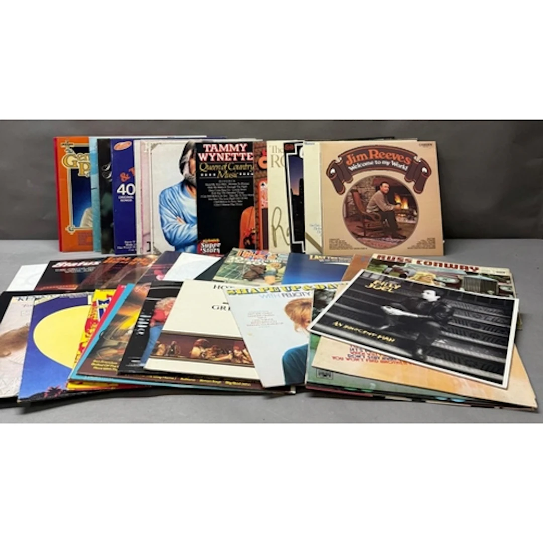 A selection of vinyl LP's to include Billy Joel, Kenny Roger...