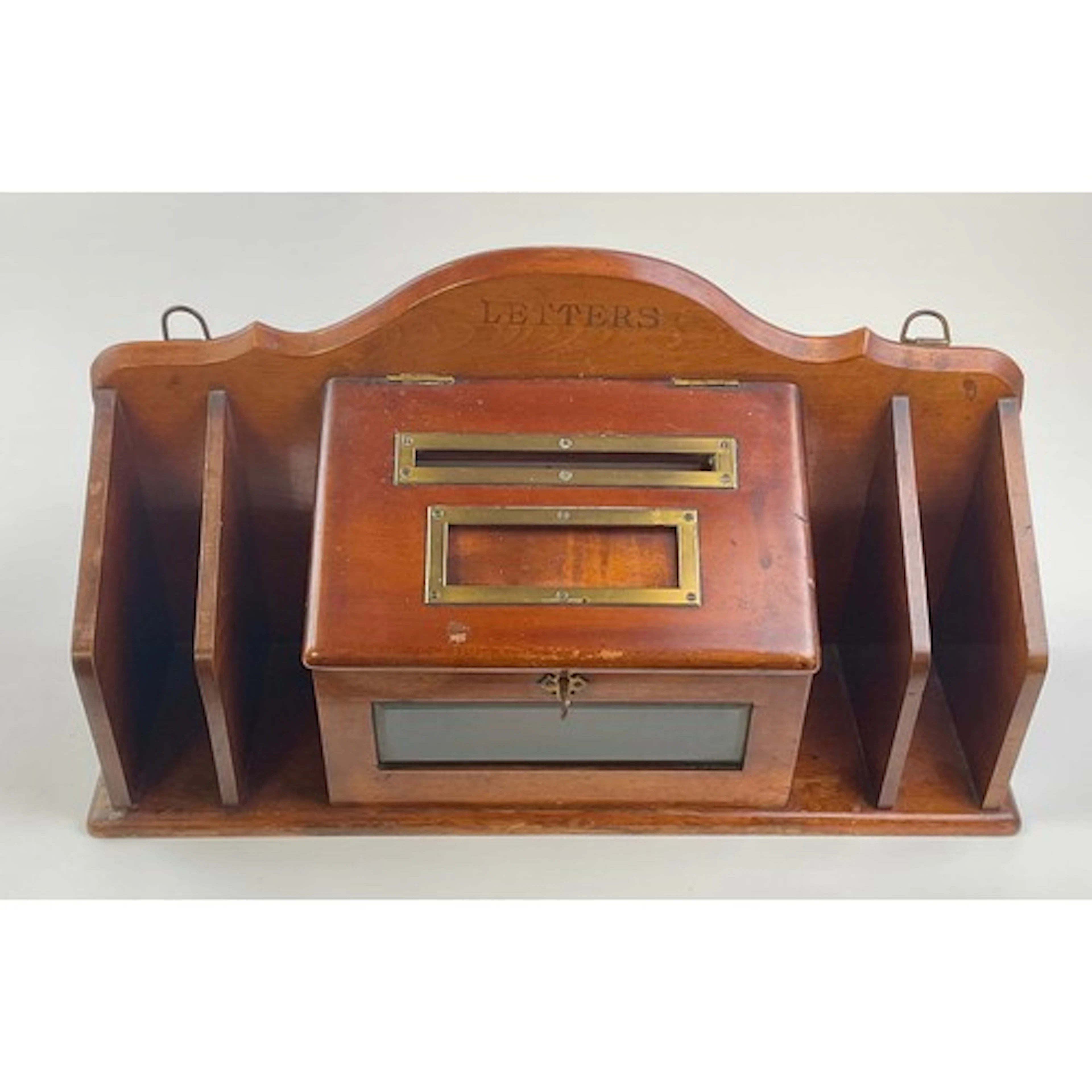 A Victorian mahogany country house post box, shaped serpenti...
