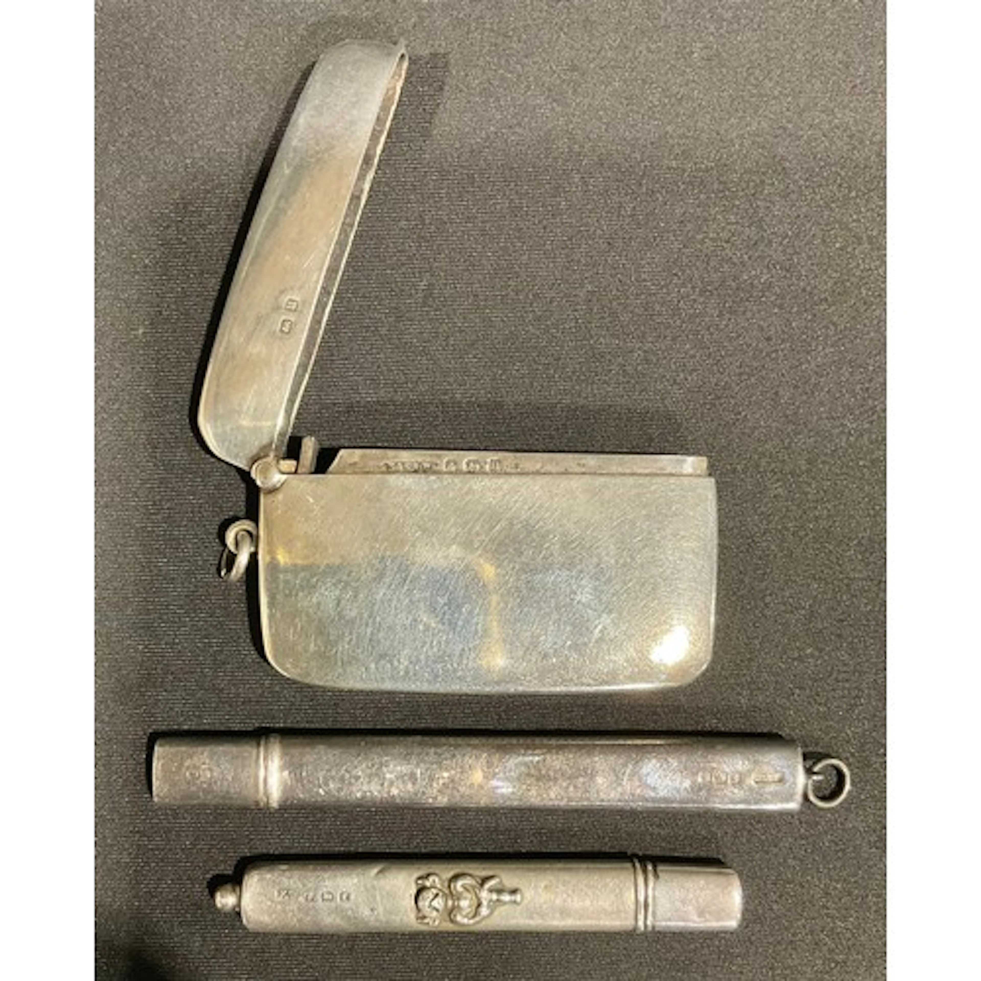 A George VI silver vesta case, quite plain, 7cm wide to susp...