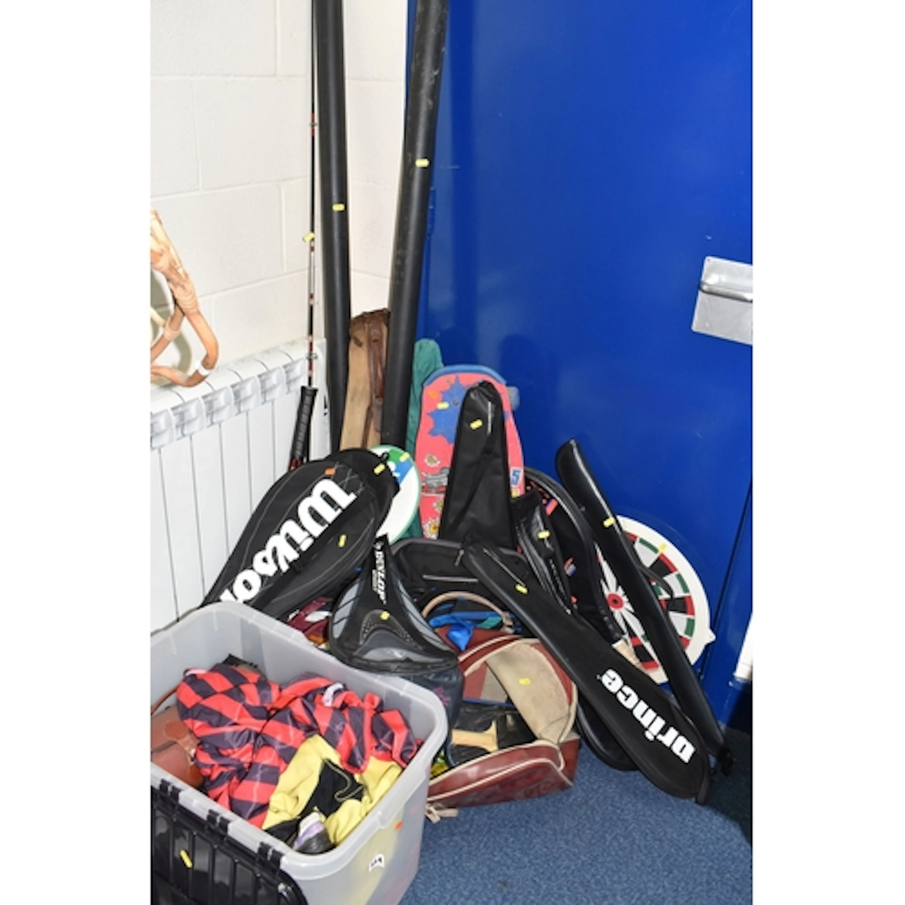 A GROUP OF ASSORTED FISHING RODS AND SPORTS RACKETS to inclu...