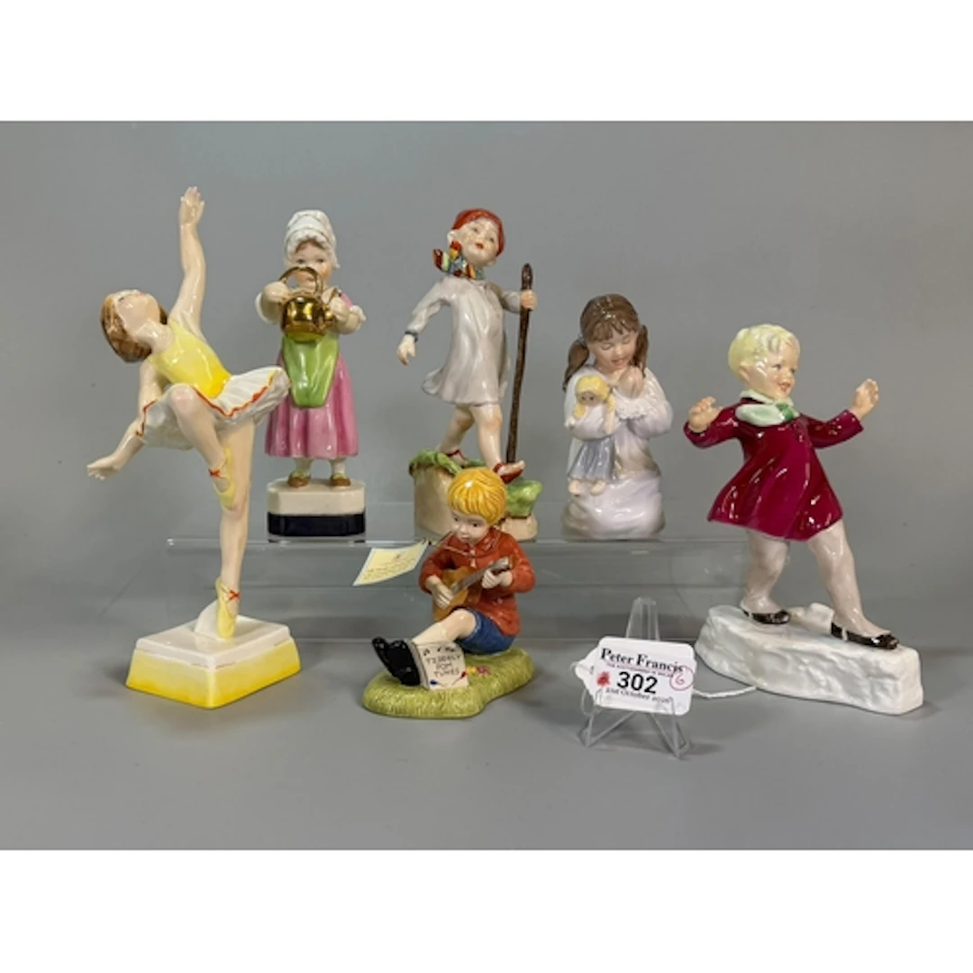Collection of Royal Worcester porcelain figurines to include...