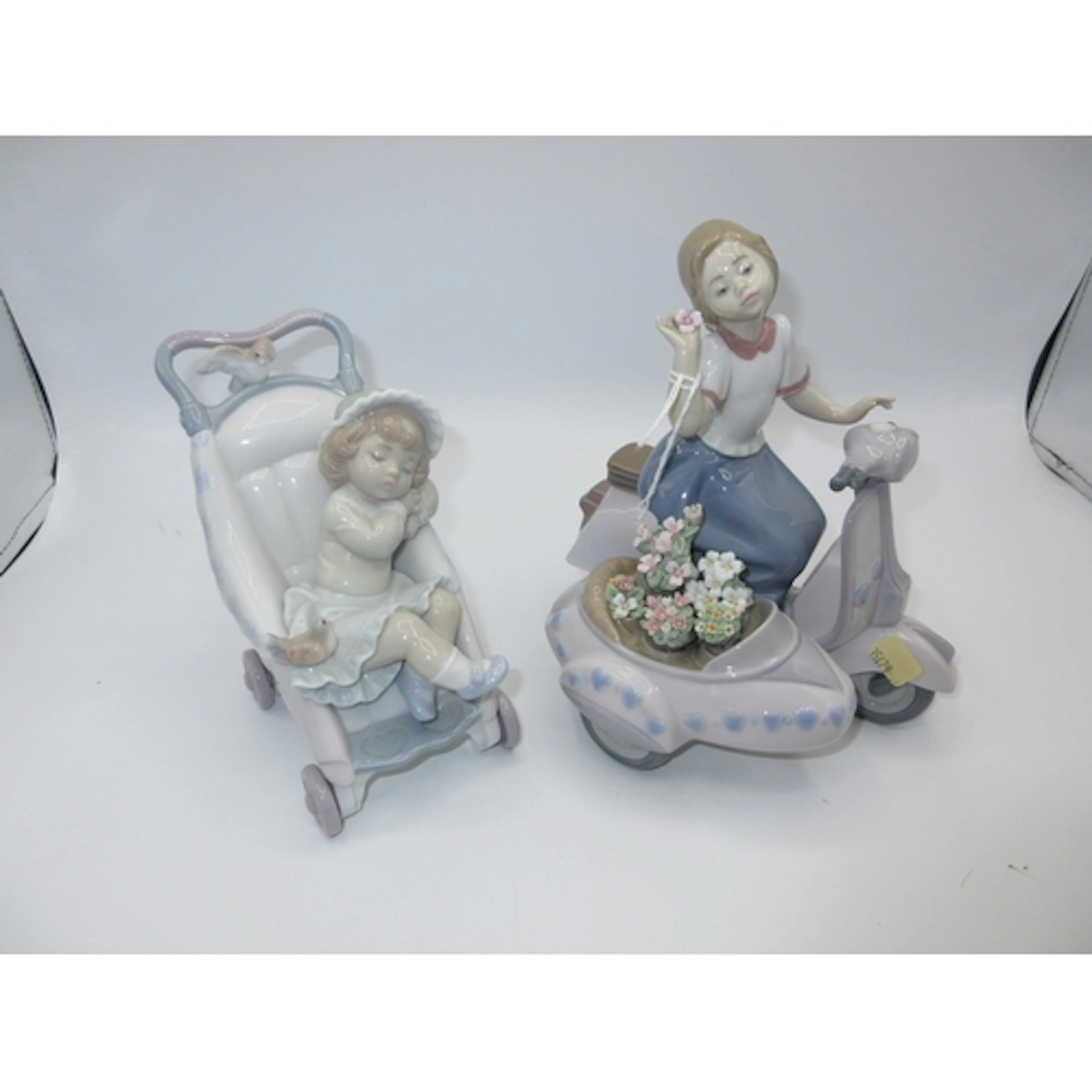 Lladro Girl on a Moped No. 5795 and Lladro Child in a Push C...