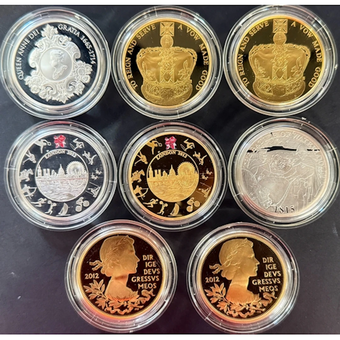 A group of eight UK QEII £5 silver proof coins, comprising 2...