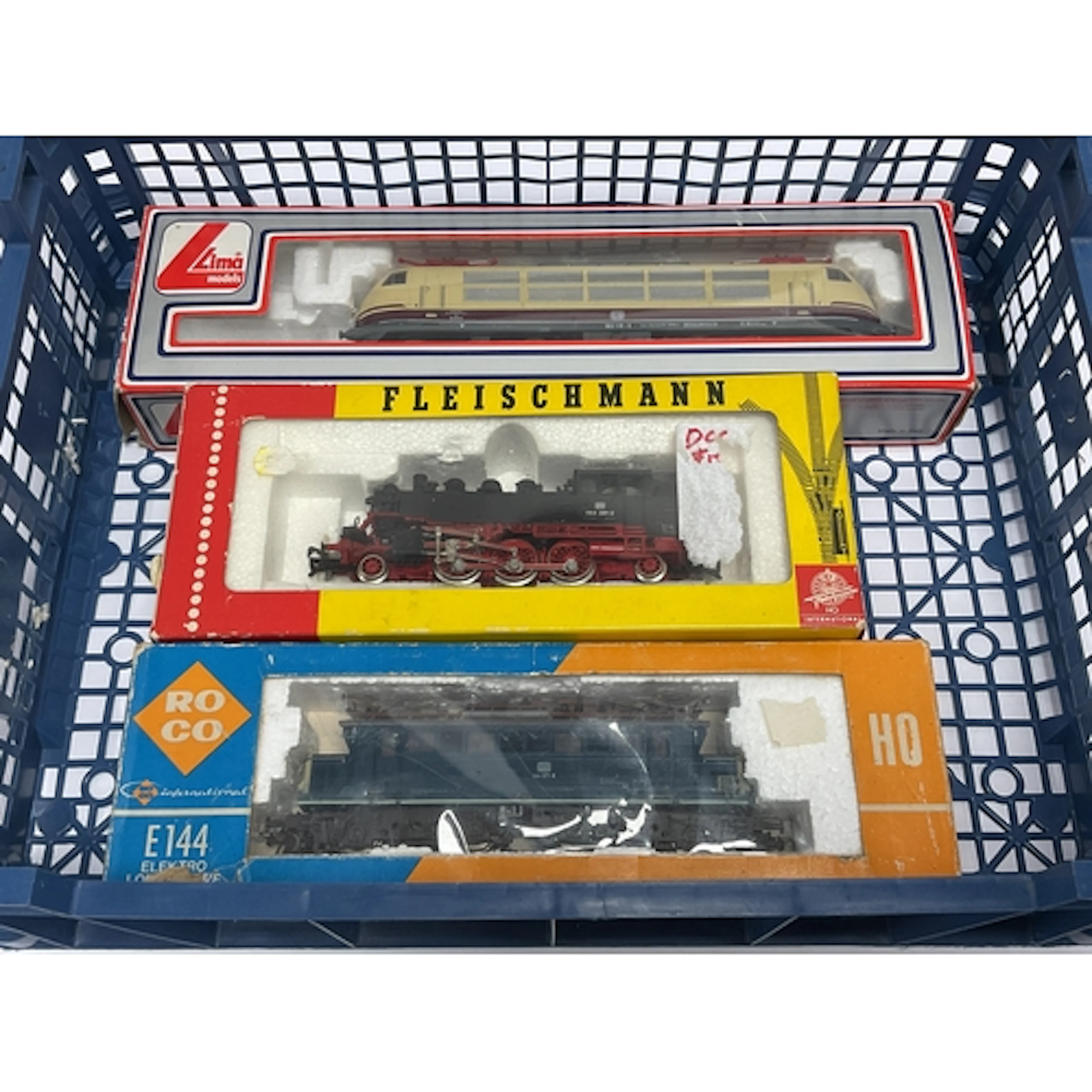 Three boxed HO scale German (DB) locomotives: a Lima Class 1...