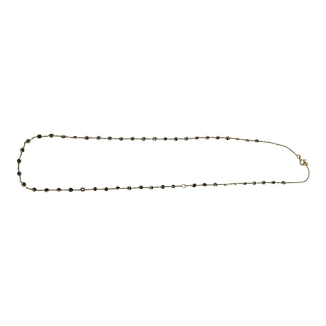 A recent yellow metal and sapphire set spectacle necklace, s...
