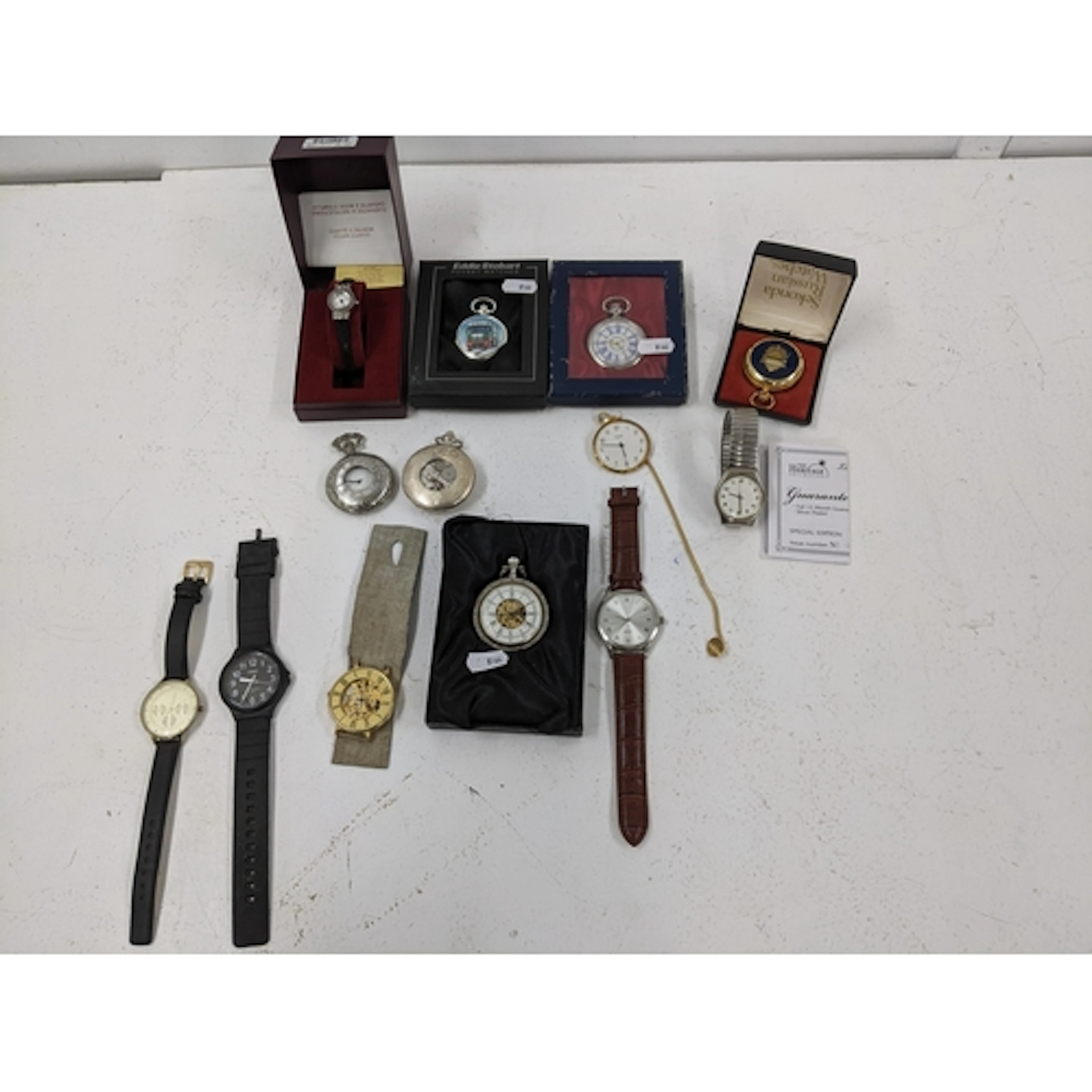 A selection of quartz pocket and wristwatches to include a b...
