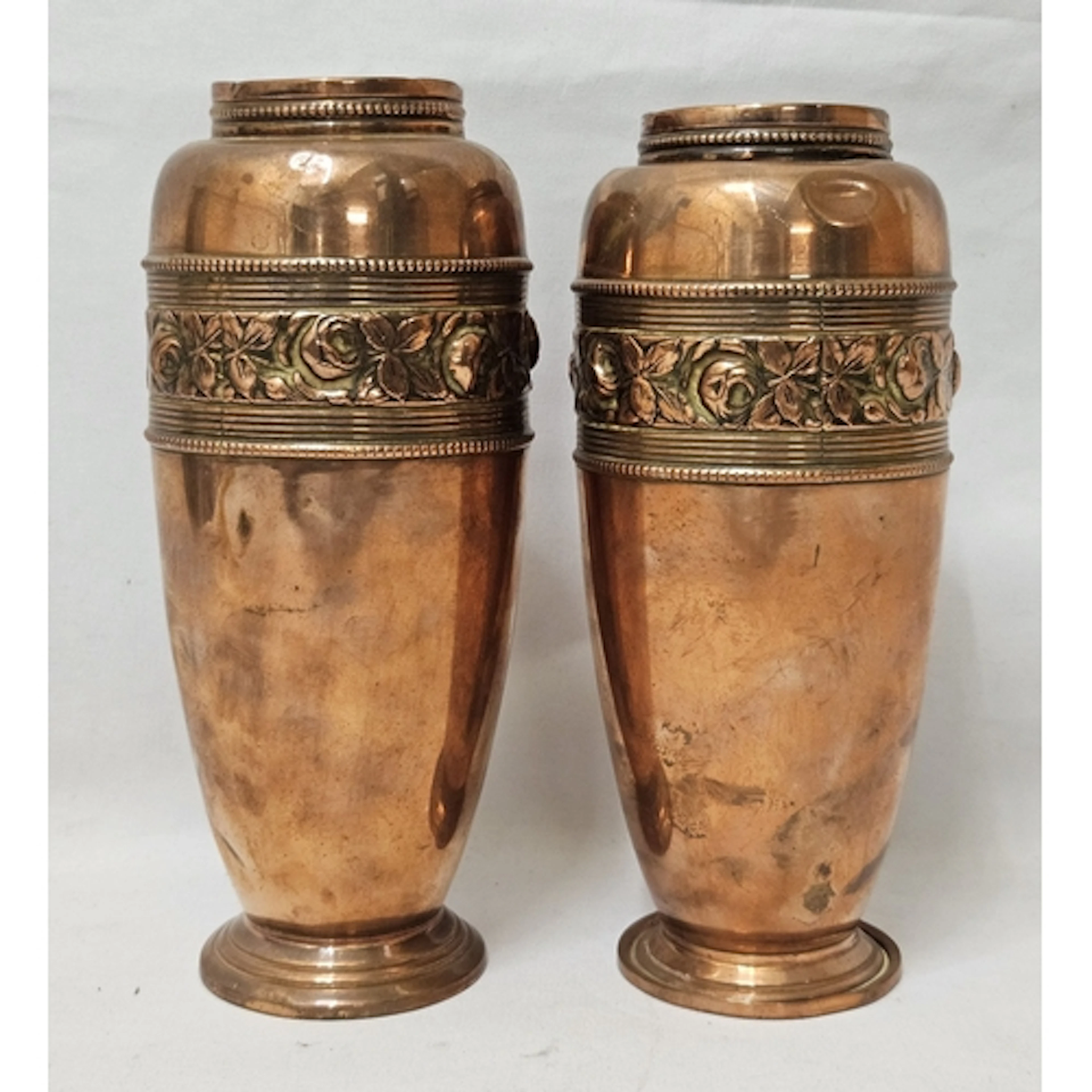 2 Vintage Copper Vases with embossed floral band on footed b...