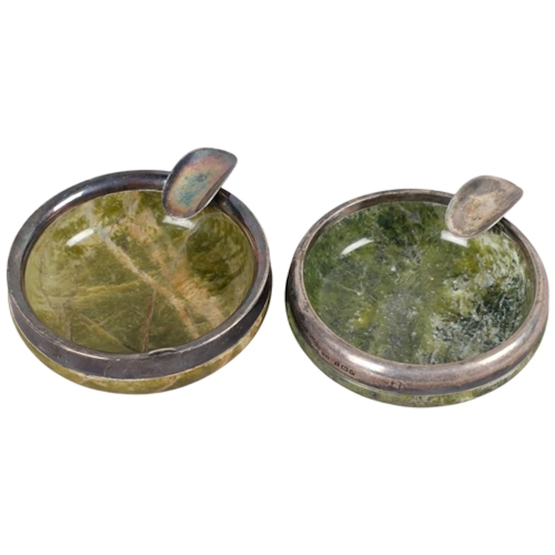A pair of silver-mounted Connemara marble ashtrays, C T Burr...
