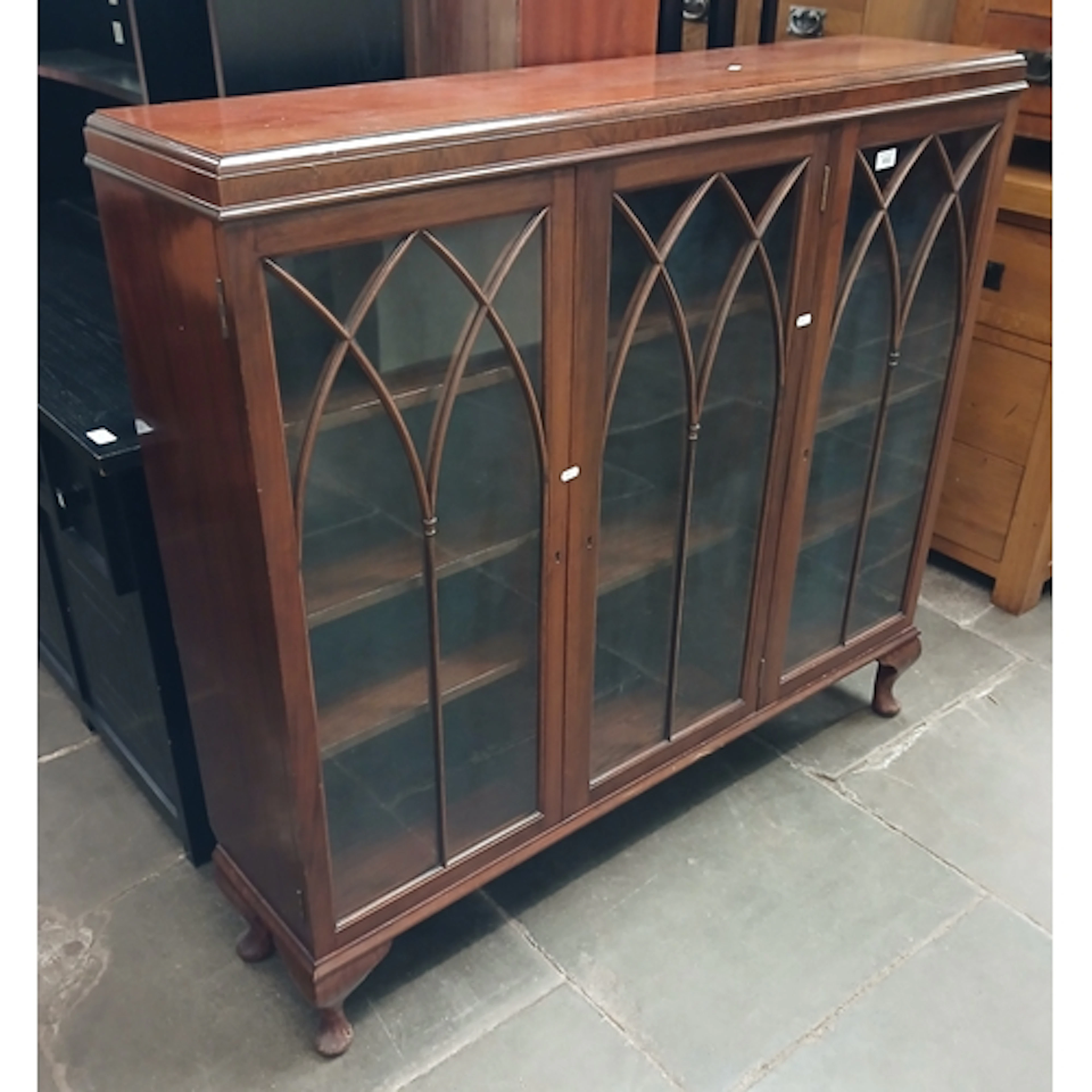 A mahogany display cabinet.