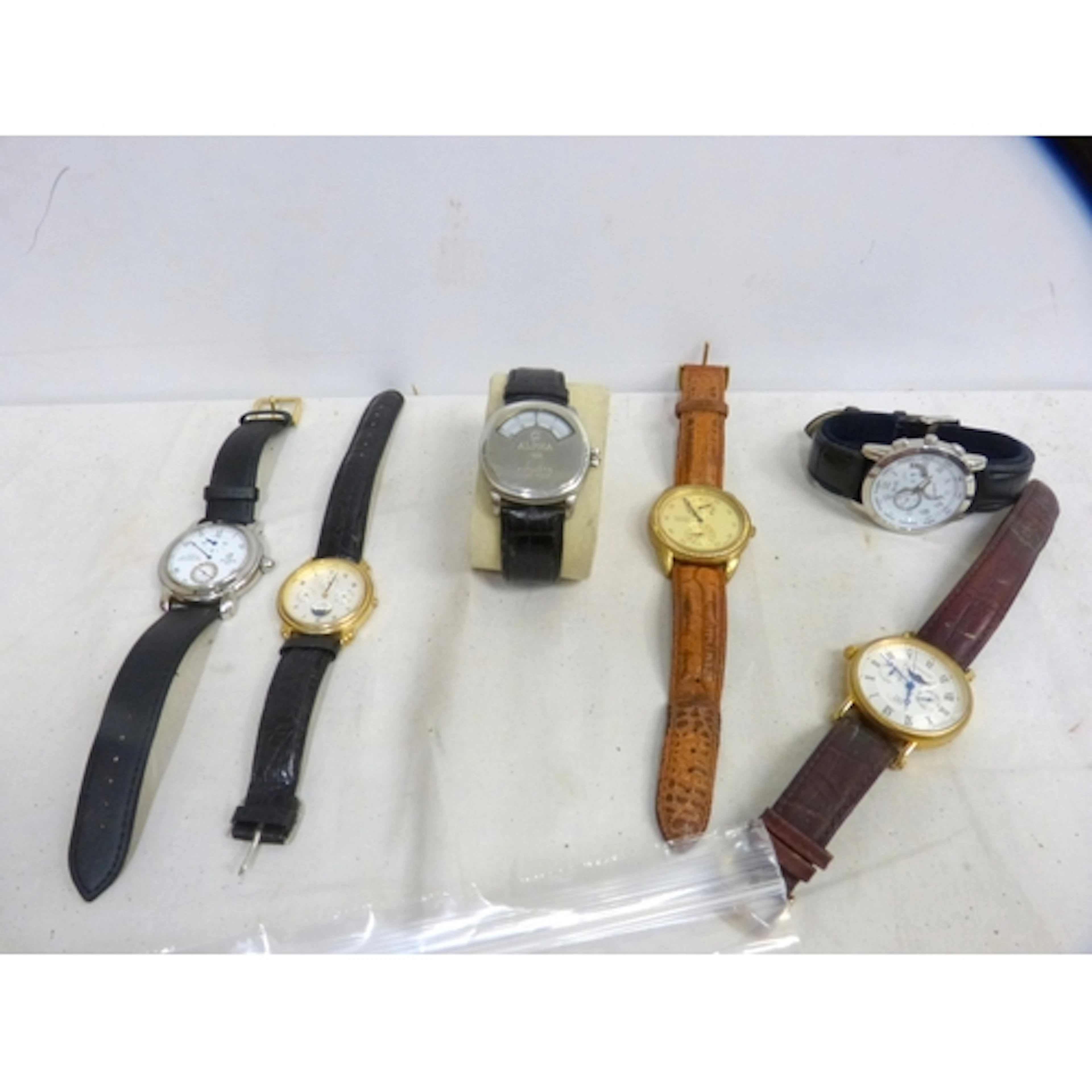 Various men's watches including Alpha, Moon watches etc.
