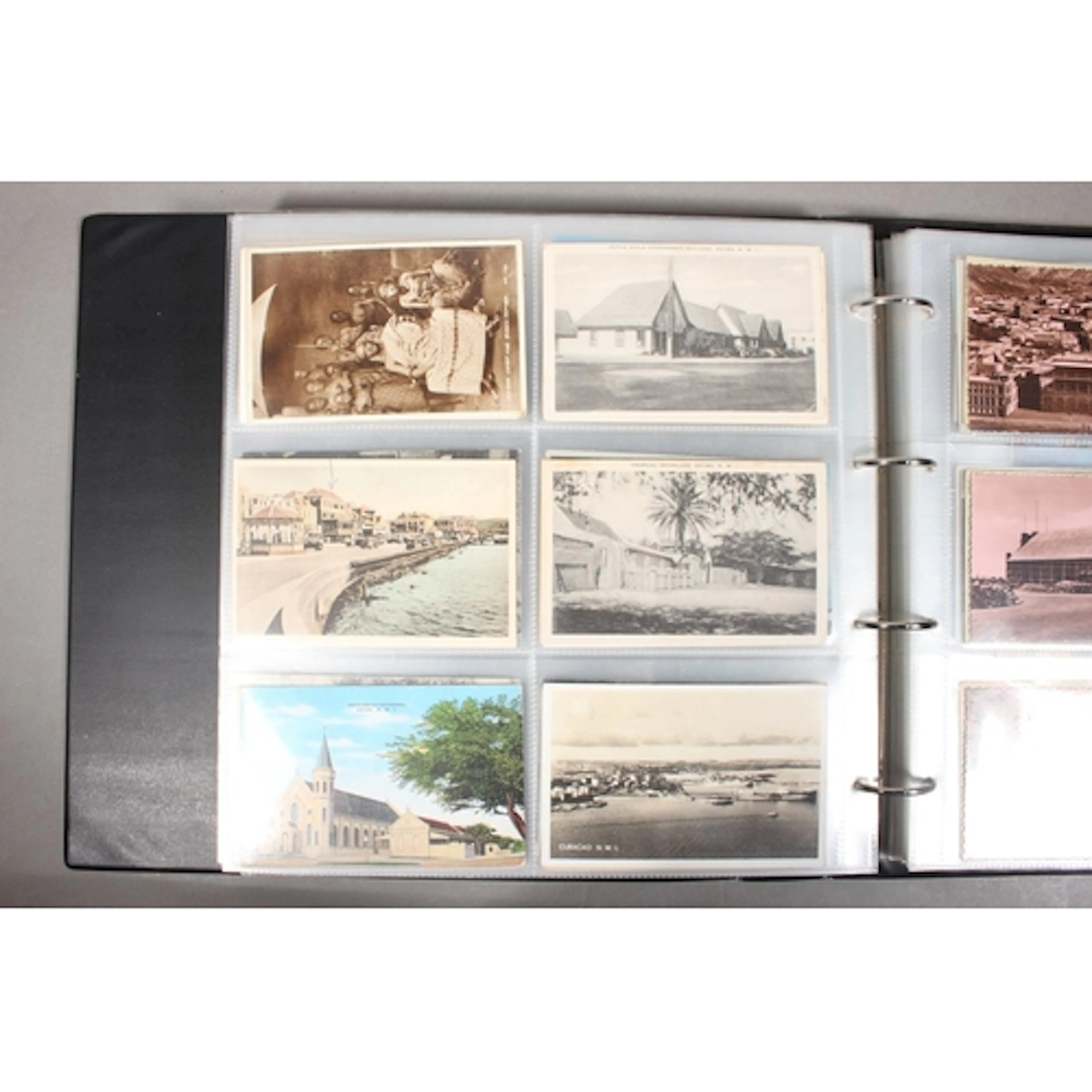 Postcard collection held in large format ring binder album c...