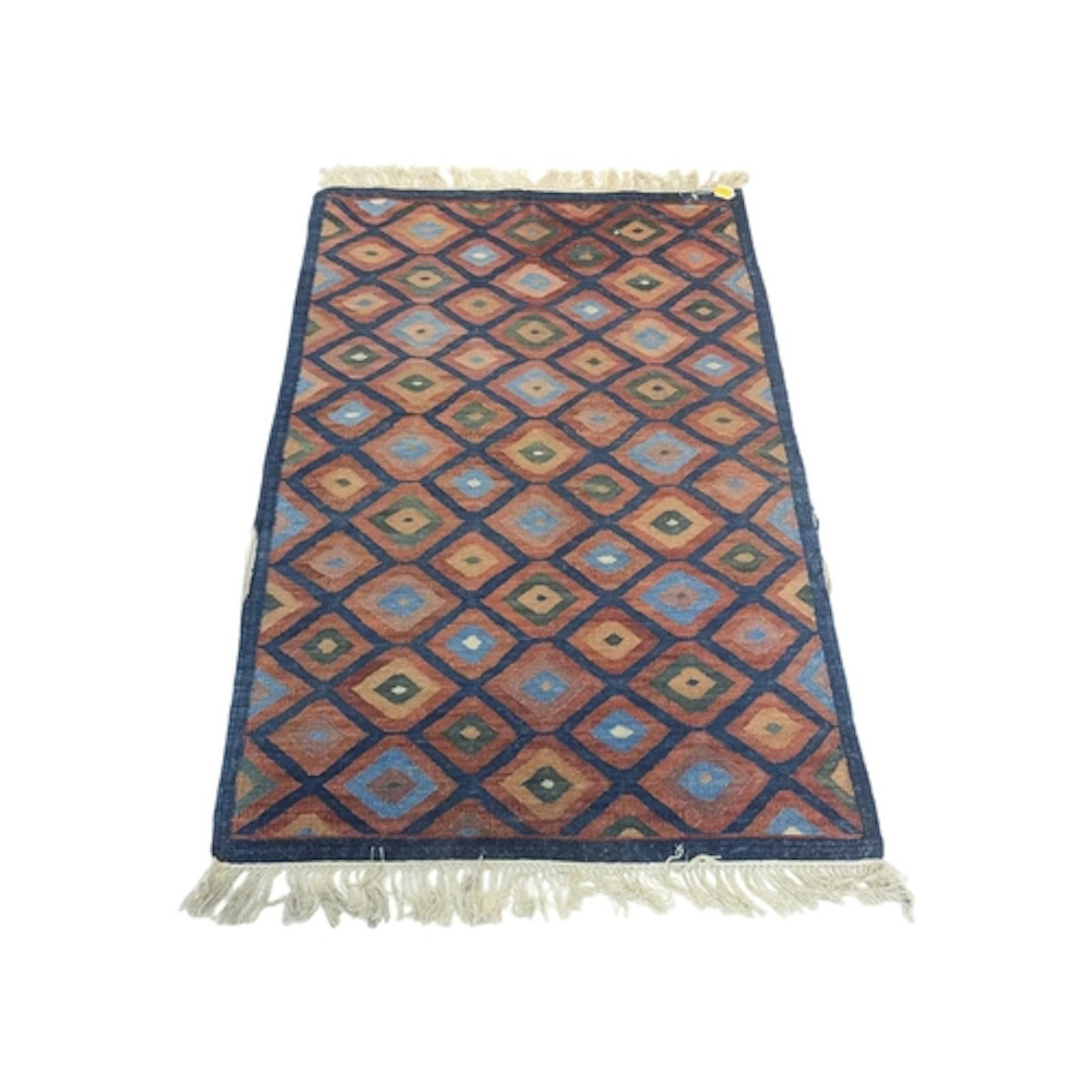 A 20th century Turkish kilim wool rug carpet. The rig having...