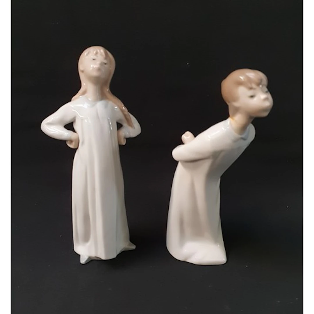 TWO LLADRO FIGURINES comprising 'Boy Kissing', 4869, 21cm h...