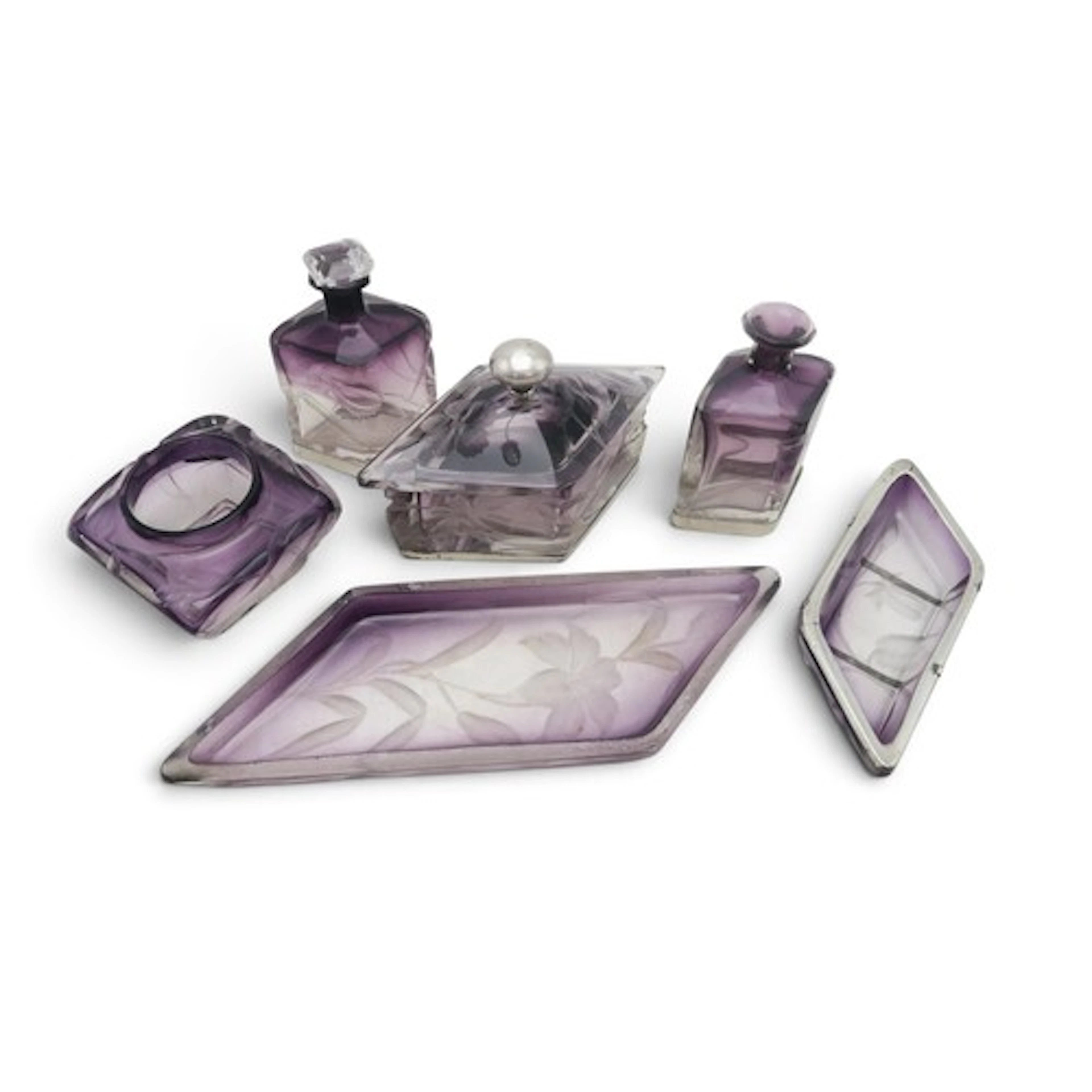 A MOSER AMETHYST GLASS PART DRESSING TABLE SET comprising a ...
