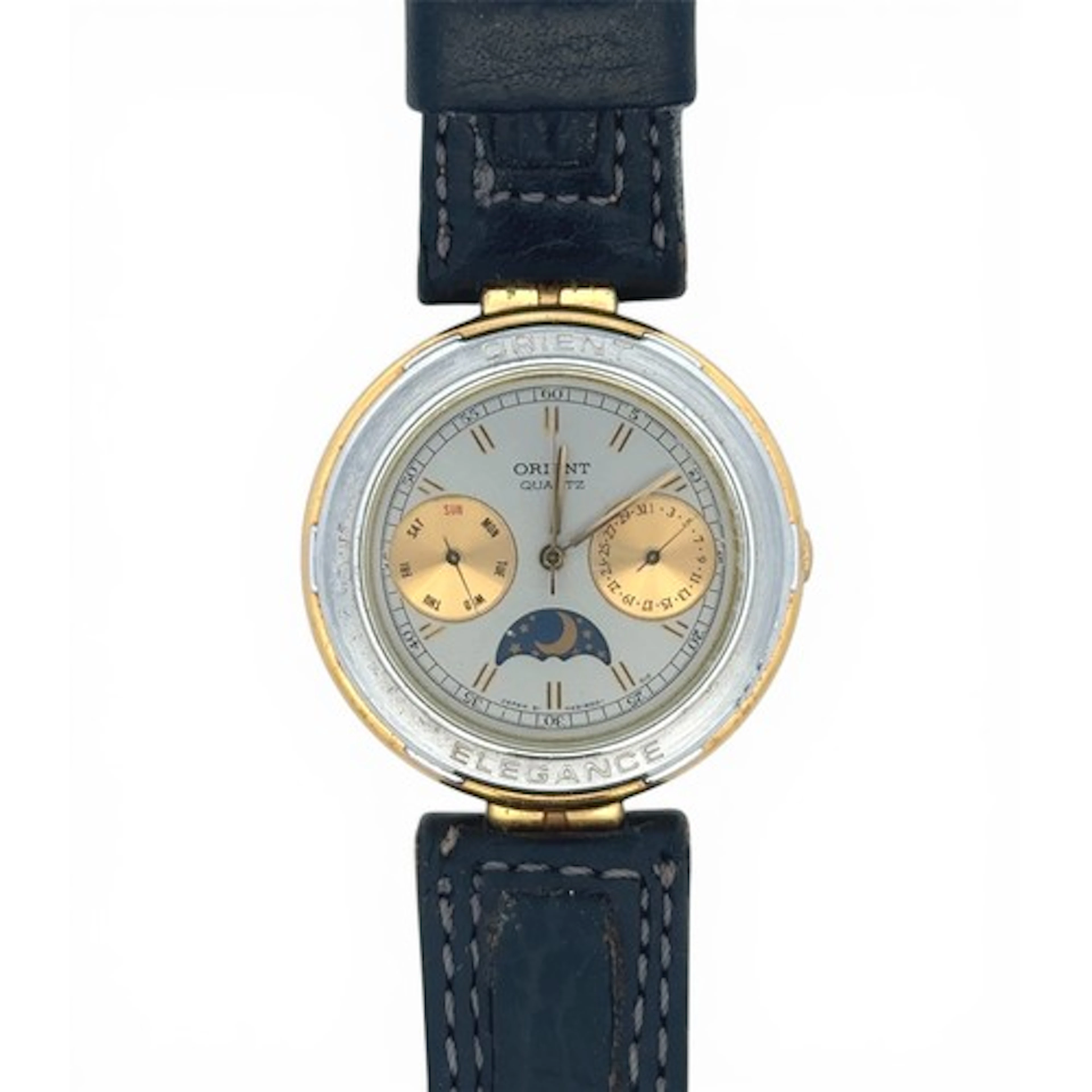 An Orient Elegance quartz watch, model No. H49010-00 CS.