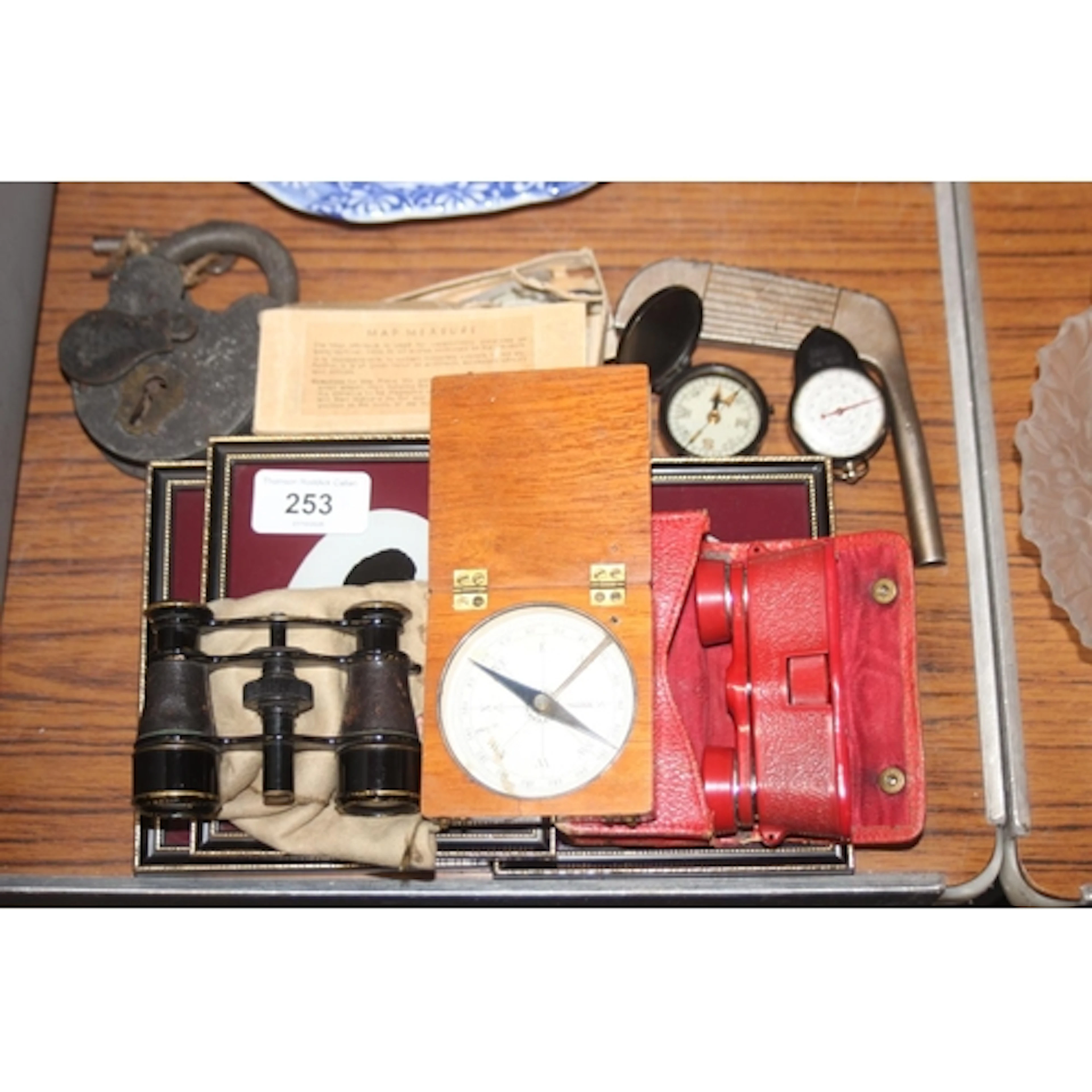 Opera glasses, framed silhouette portraits, compass, etc.