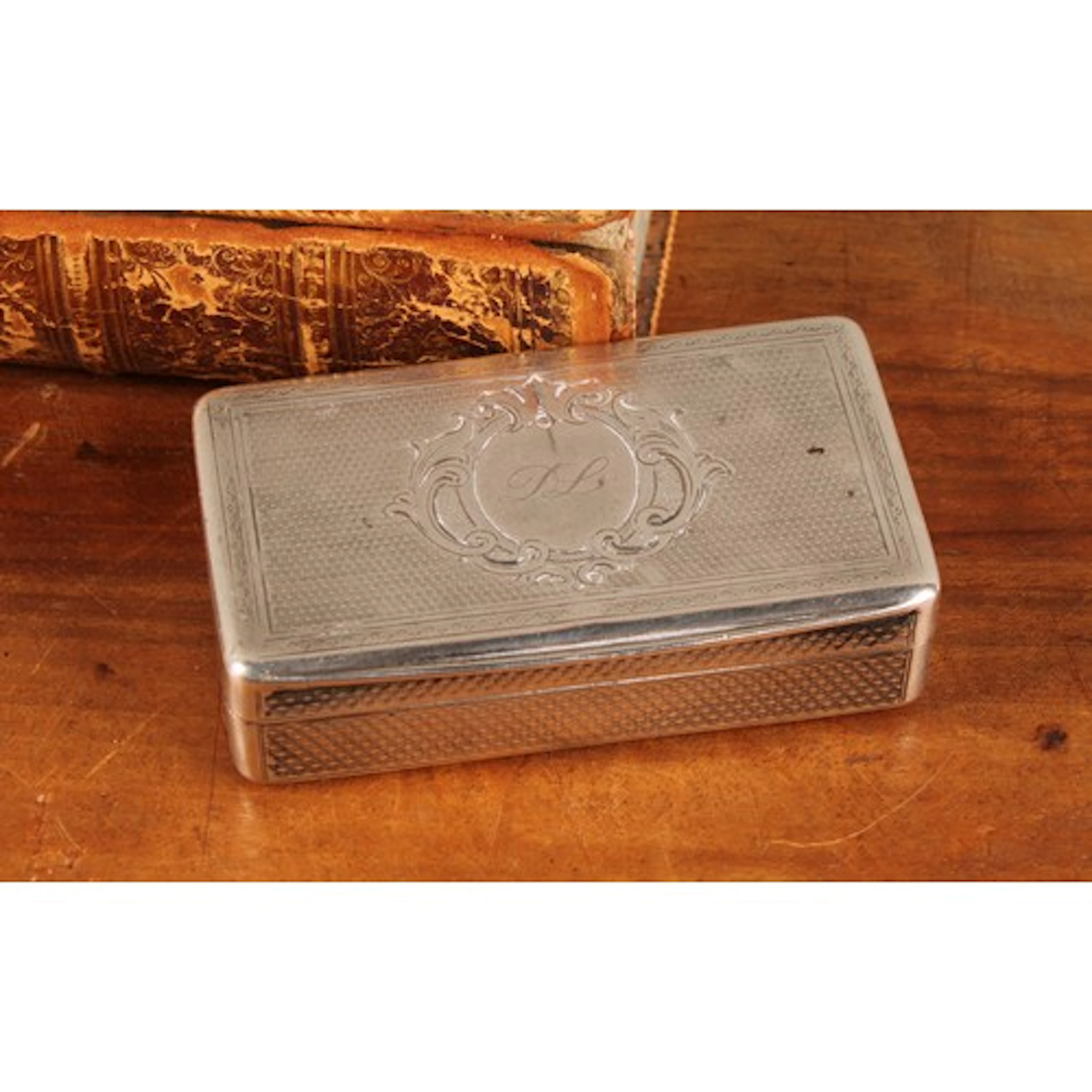 A 19th century German silver rectangular snuff box, the hing...