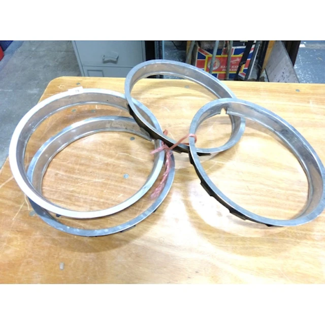 Set of five chrome 1970's wheel trims.