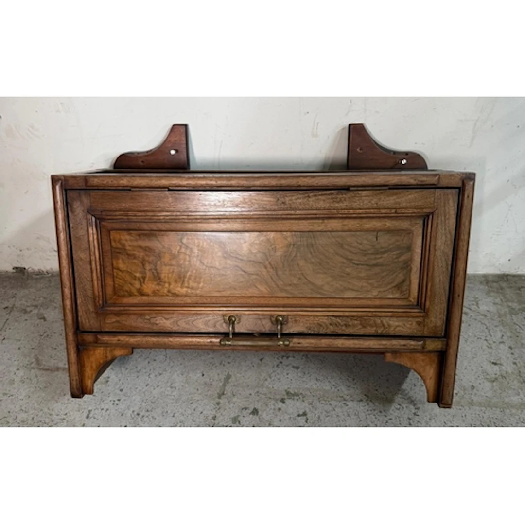 A flame mahogany drop-front wall hanging storage cabinet. 72...