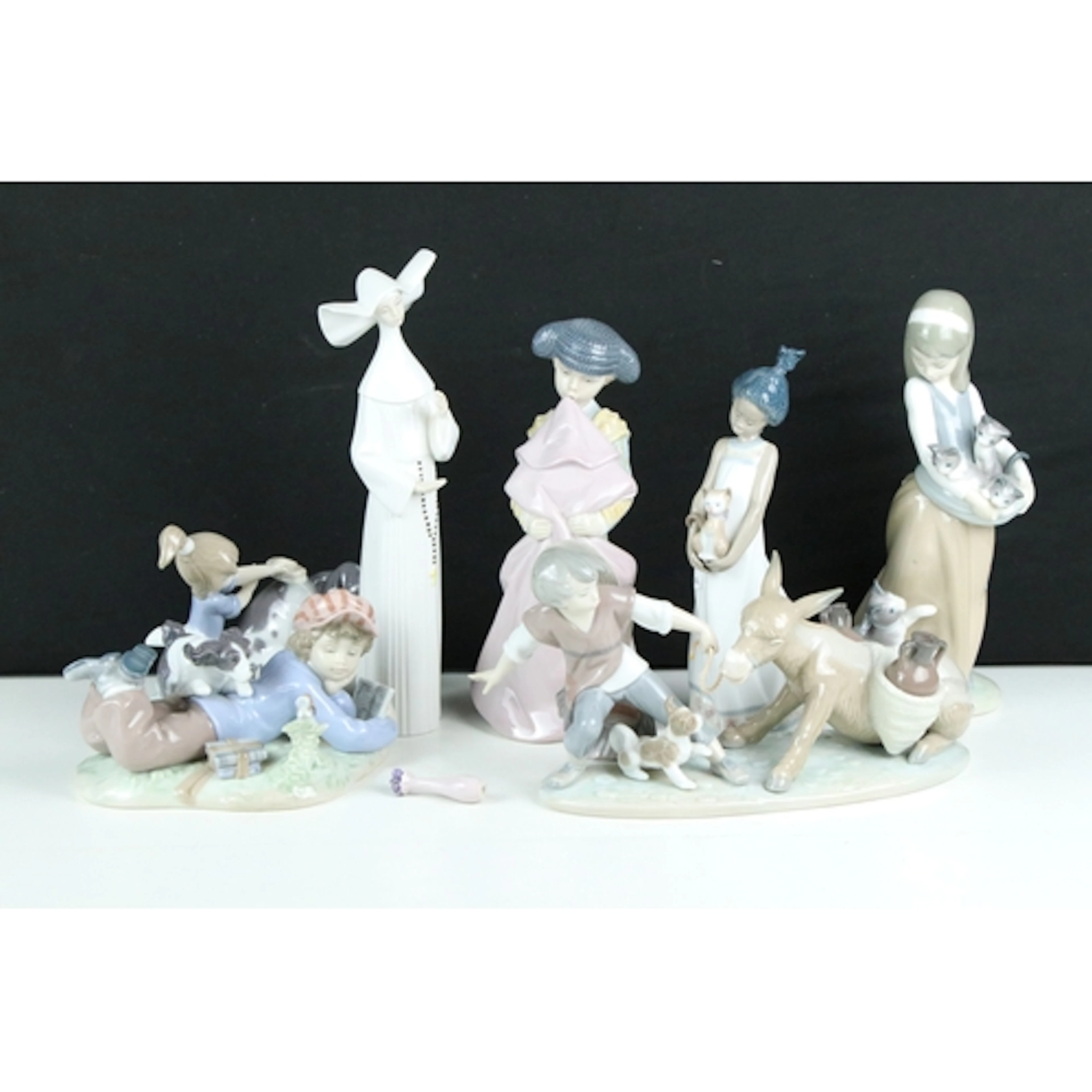 Seven Lladro figurines to include #5178 'Stubborn Donkey', #...