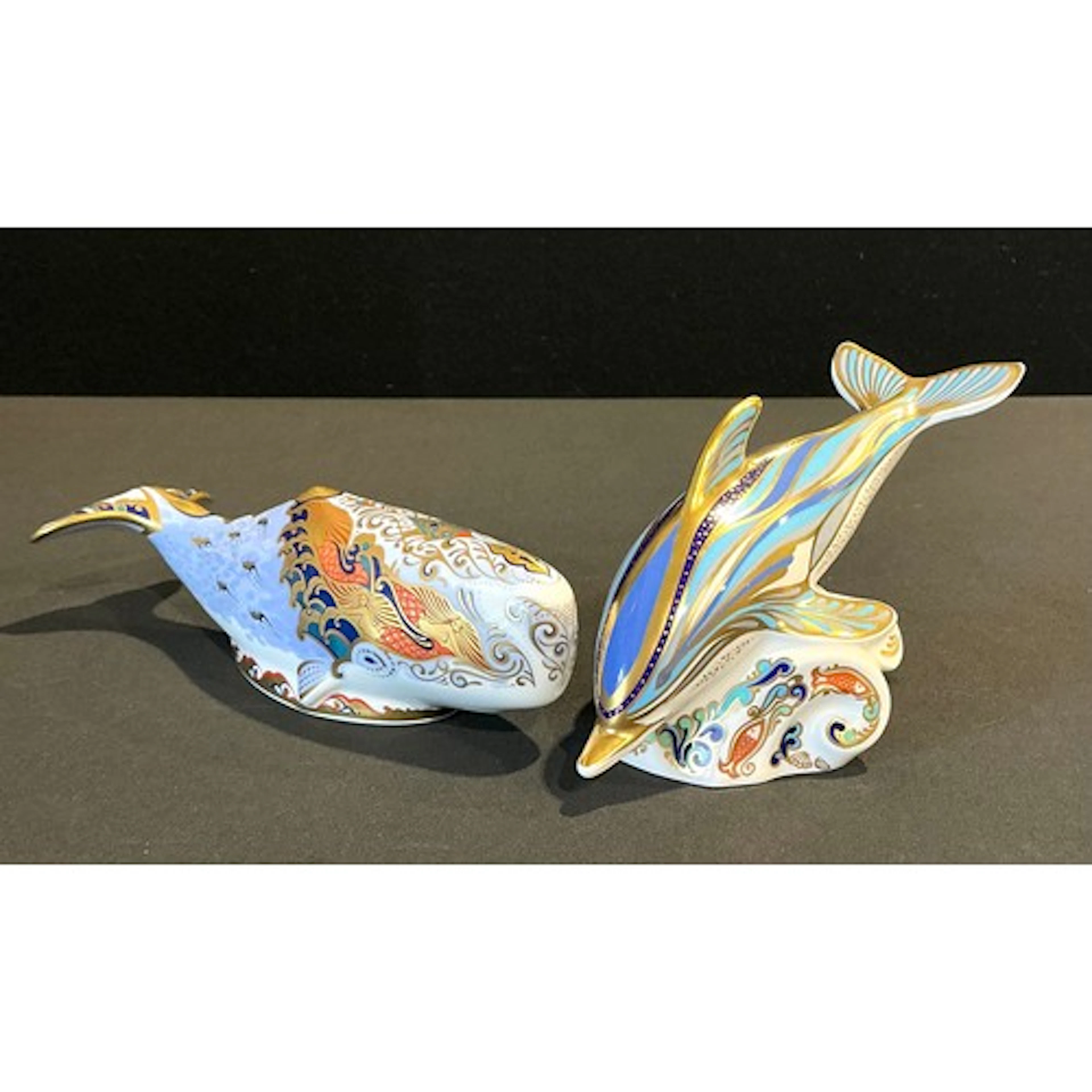 A Royal Crown Derby paperweight, Striped Dolphin, modelled b...