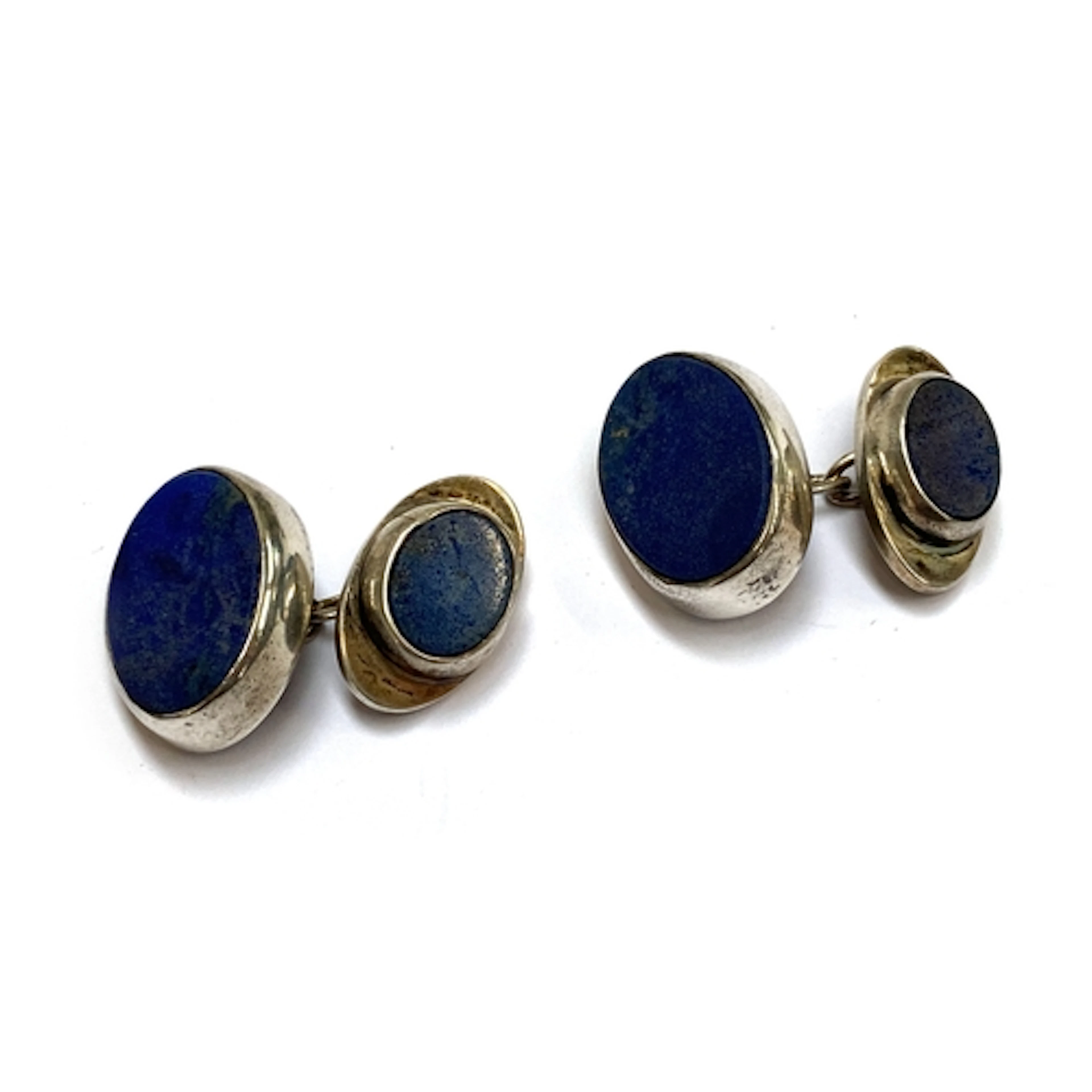 A pair of Modernist silver and lapis lazuli cufflinks, hallm...