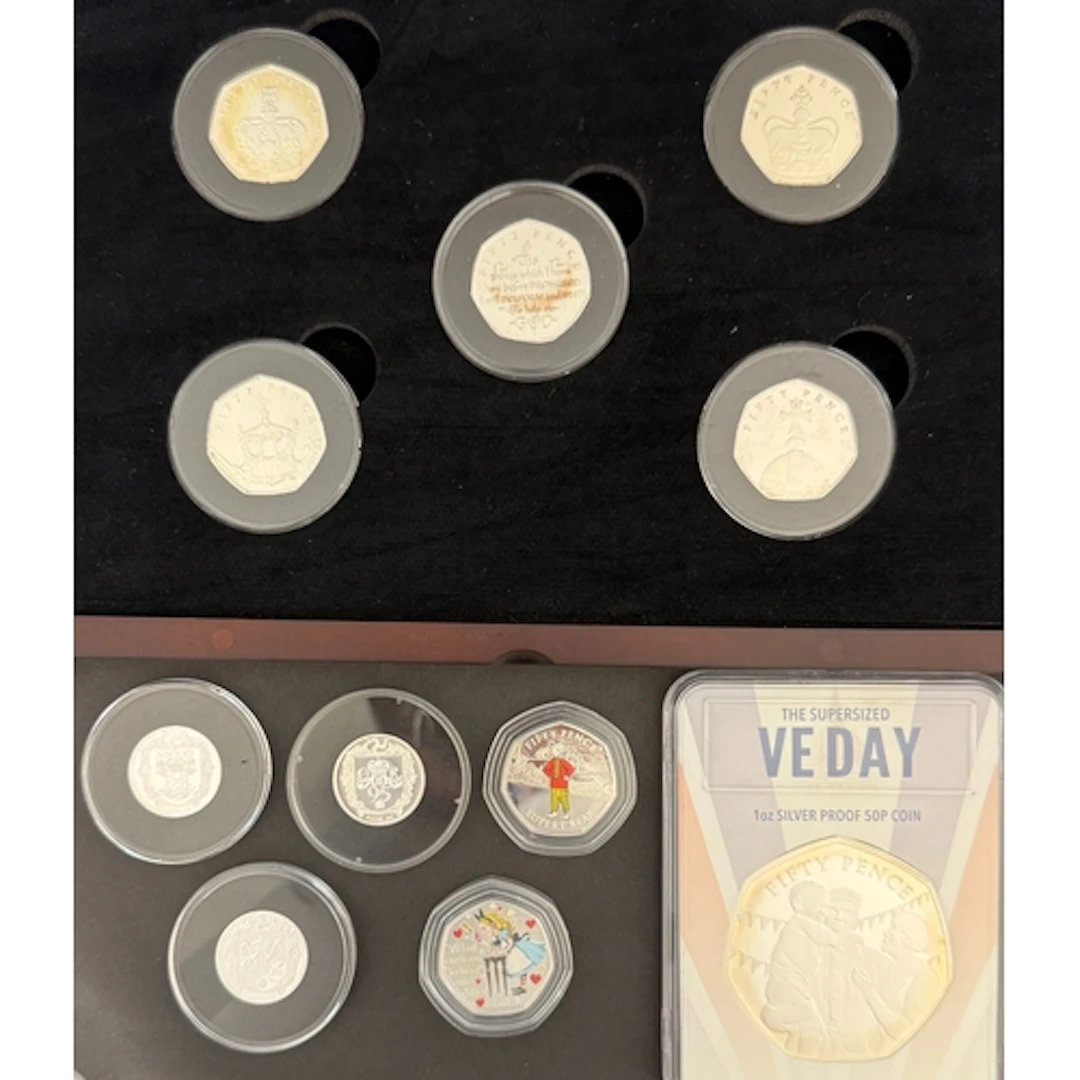 A group of 11 Isle of Man silver proof coins, comprising the...