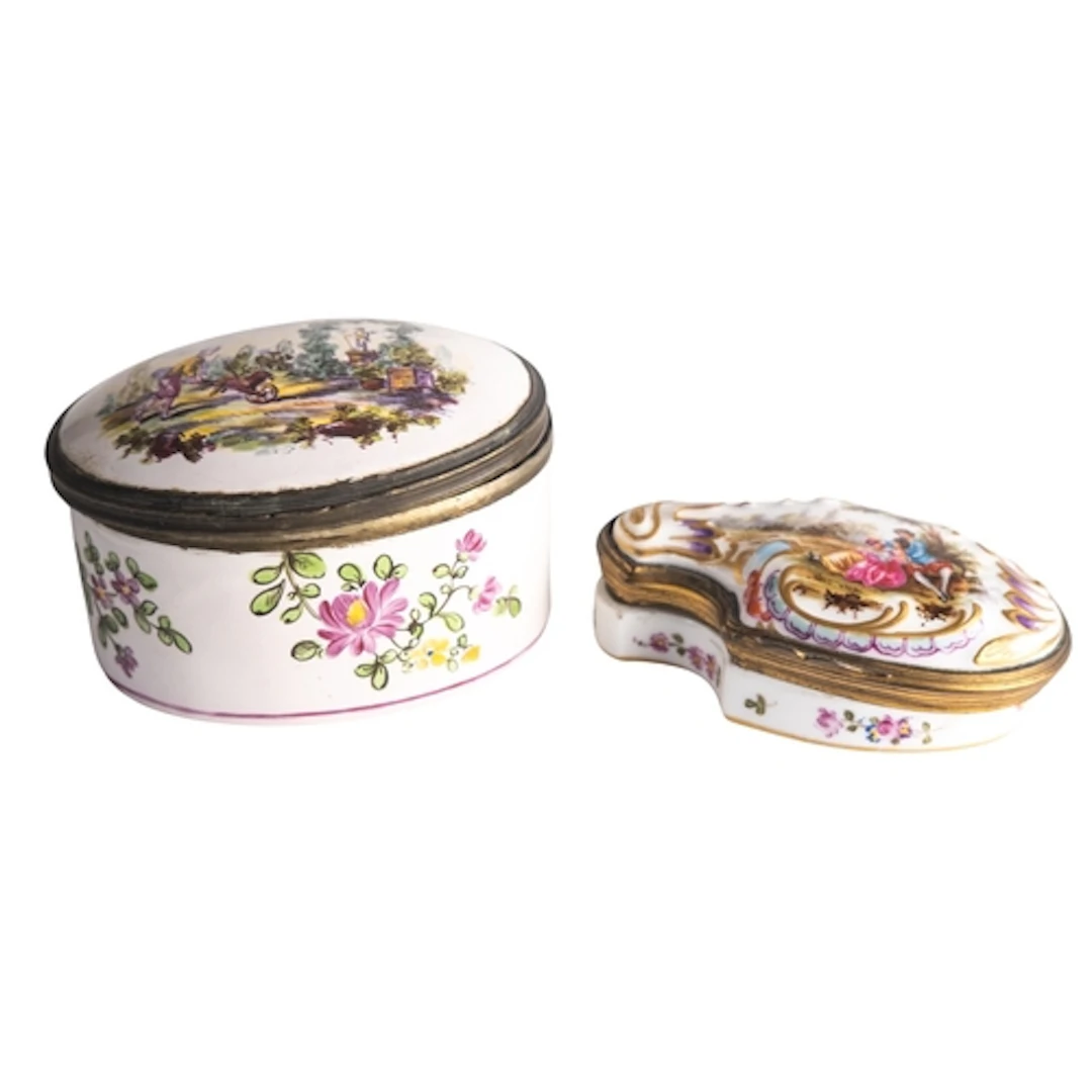Two porcelain boxes and covers comprising an oval example pa...