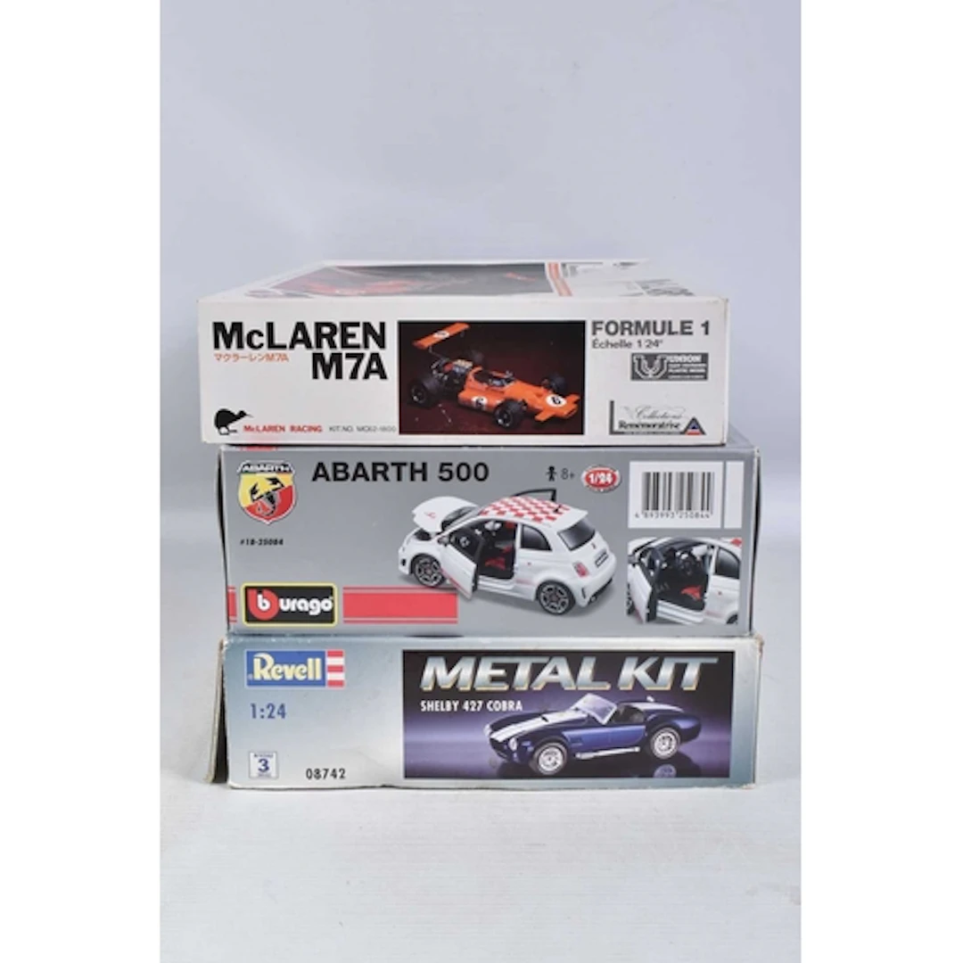 THREE BOXED UNBUILT 1:24 VEHICLE MODEL KITS, to include a Bb...