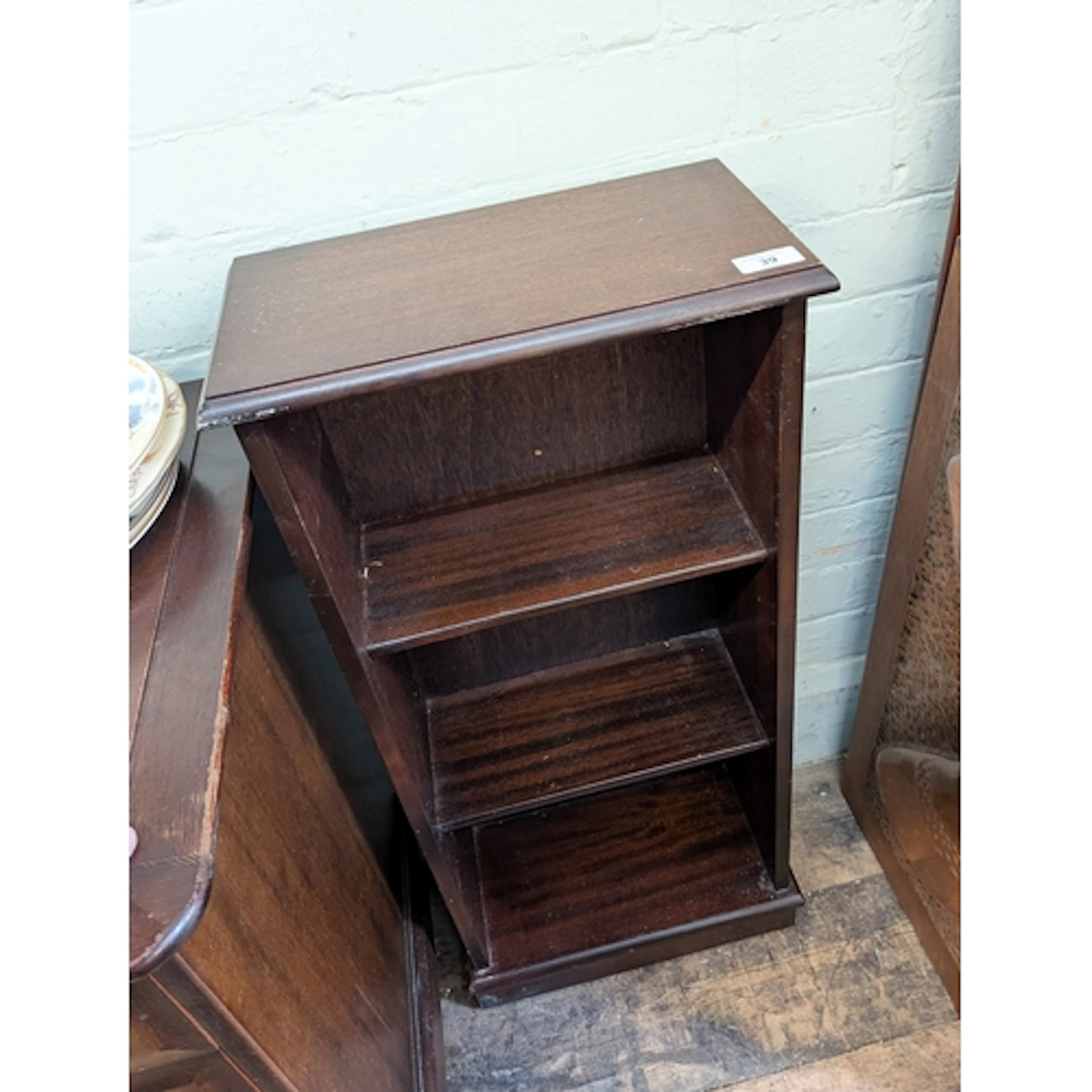 A small four tier mahogany open bookcase, 15" wide