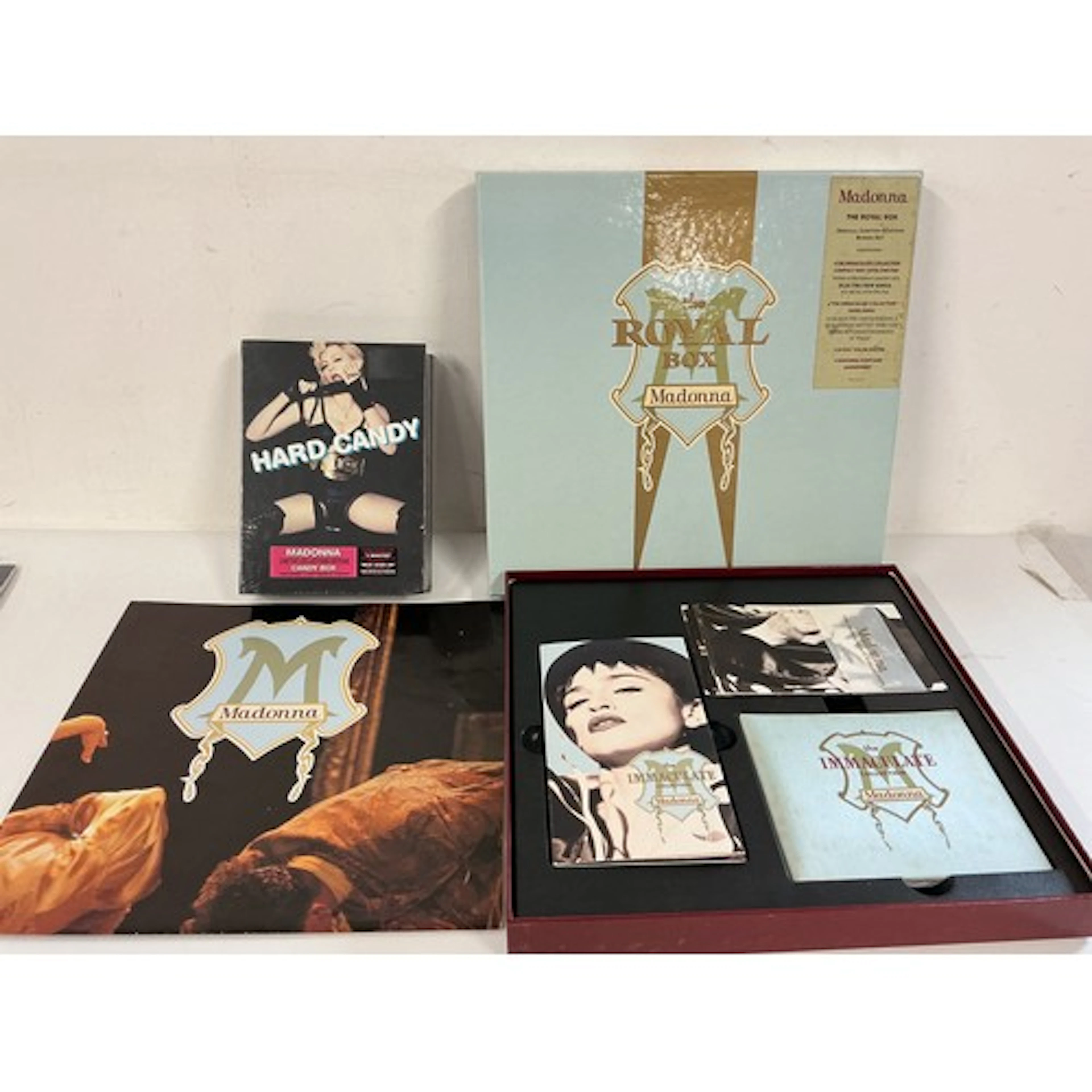 A Madonna Royal Box CD/VHS box set and a sealed Hard Candy b...